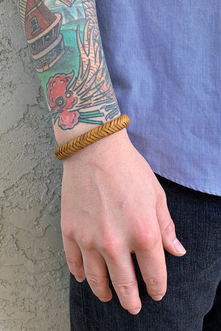 Anju Jewelry mens braided leather bracelet. Shop men’s jewelry for everyday wear. Men’s leather jewelry. Casual men’s jewelry. Popular men’s jewelry styles for casual outfits. Adventurous jewelry for men. Indian jewelry for men. Handmade jewelry for men of all styles. Feel the spirit of India when you wear Anju’s jewelry for men. Genuine leather necklaces and handwoven leather bracelets include metal accents and wooden accents. Easy men’s jewelry with an Indian flair will keep you looking stylish all day.