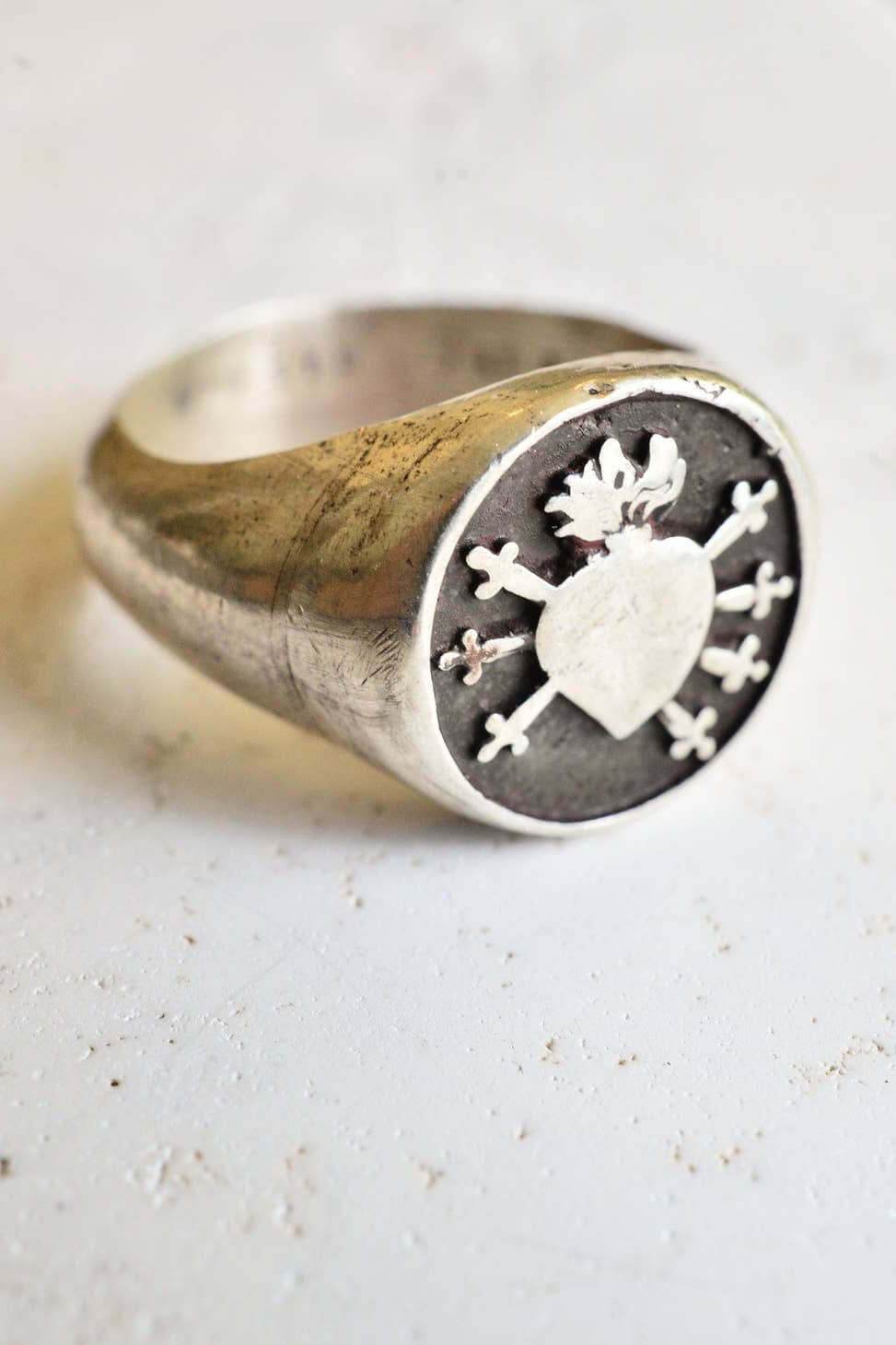 Montestruque seven sorrows heart signet ring. Shop Montestruque jewelry today. Featuring handcrafted jewelry, historic jewelry styles, Sustainable Practices  and a love of nature, shop medieval themed jewelry for men and women. Coin necklaces for women. Signet rings for men. Medieval jewelry for women. Medieval jewelry for men. Zodiac jewelry for women. Magic jewelry. Fantasy jewelry. Nature jewelry for women. Moon and stars jewelry. Unisex jewelry.