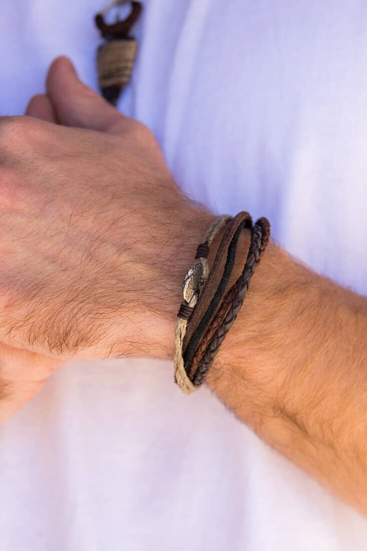 Anju Jewelry multi strand mens leather bracelet. Shop men’s jewelry for everyday wear. Men’s leather jewelry. Casual men’s jewelry. Popular men’s jewelry styles for casual outfits. Adventurous jewelry for men. Indian jewelry for men. Handmade jewelry for men of all styles. Feel the spirit of India when you wear Anju’s jewelry for men. Genuine leather necklaces and handwoven leather bracelets include metal accents and wooden accents. Easy men’s jewelry with an Indian flair will keep you looking stylish.