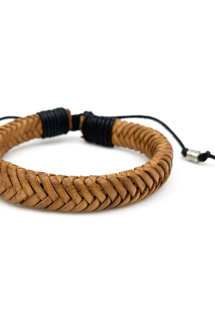 anju jewelry aadi mens bracelet. Shop men’s jewelry for everyday wear. Men’s leather jewelry. Casual men’s jewelry. Popular men’s jewelry styles for casual outfits. Adventurous jewelry for men. Indian jewelry for men. Handmade jewelry for men of all styles. Feel the spirit of India when you wear Anju’s jewelry for men. Genuine leather necklaces and handwoven leather bracelets include metal accents and wooden accents. Easy men’s jewelry with an Indian flair will keep you looking stylish all day long.