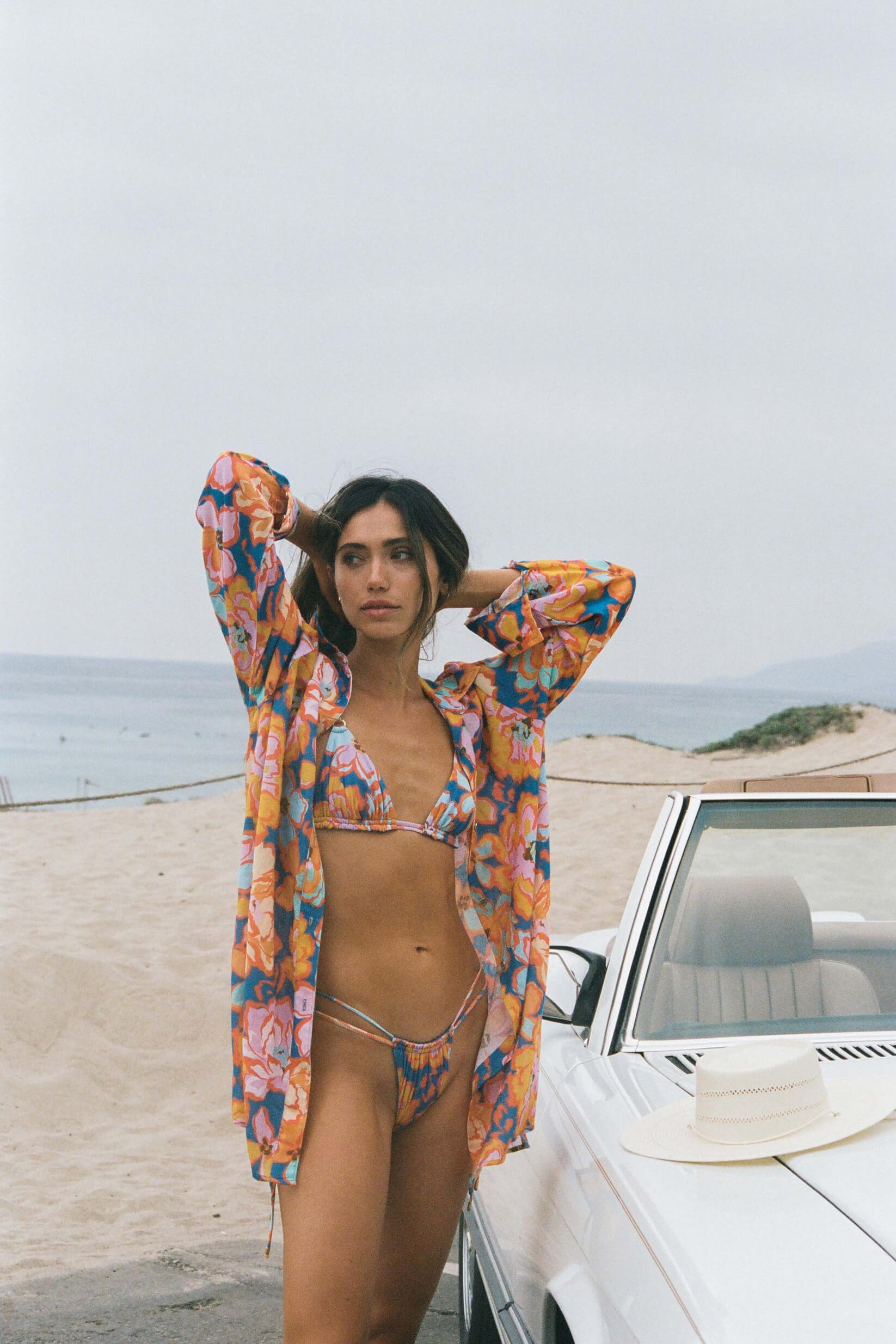 Aquari capri bottom in santorini floral. Aquari bikini top. Aquari bikini bottom. Aquari floral bikini. Aquari floral dress. Beautiful floral dress. Feminine floral dress. Elegant vacation outfits for women. Aquari floral romper. Aquari Riviera Dress. Aquari Sunrise Romper. Aquari Mira Mini Dress. Aquari Luna dress. Aquari Rio Top. Aquari Rio Bottom. Aquari Oasis Top. Aquari Native Bottom. Aquari Capri Top. Aquari Capri Bottom. Floral bikinis for summer vacation. Romantic floral clothing for women.