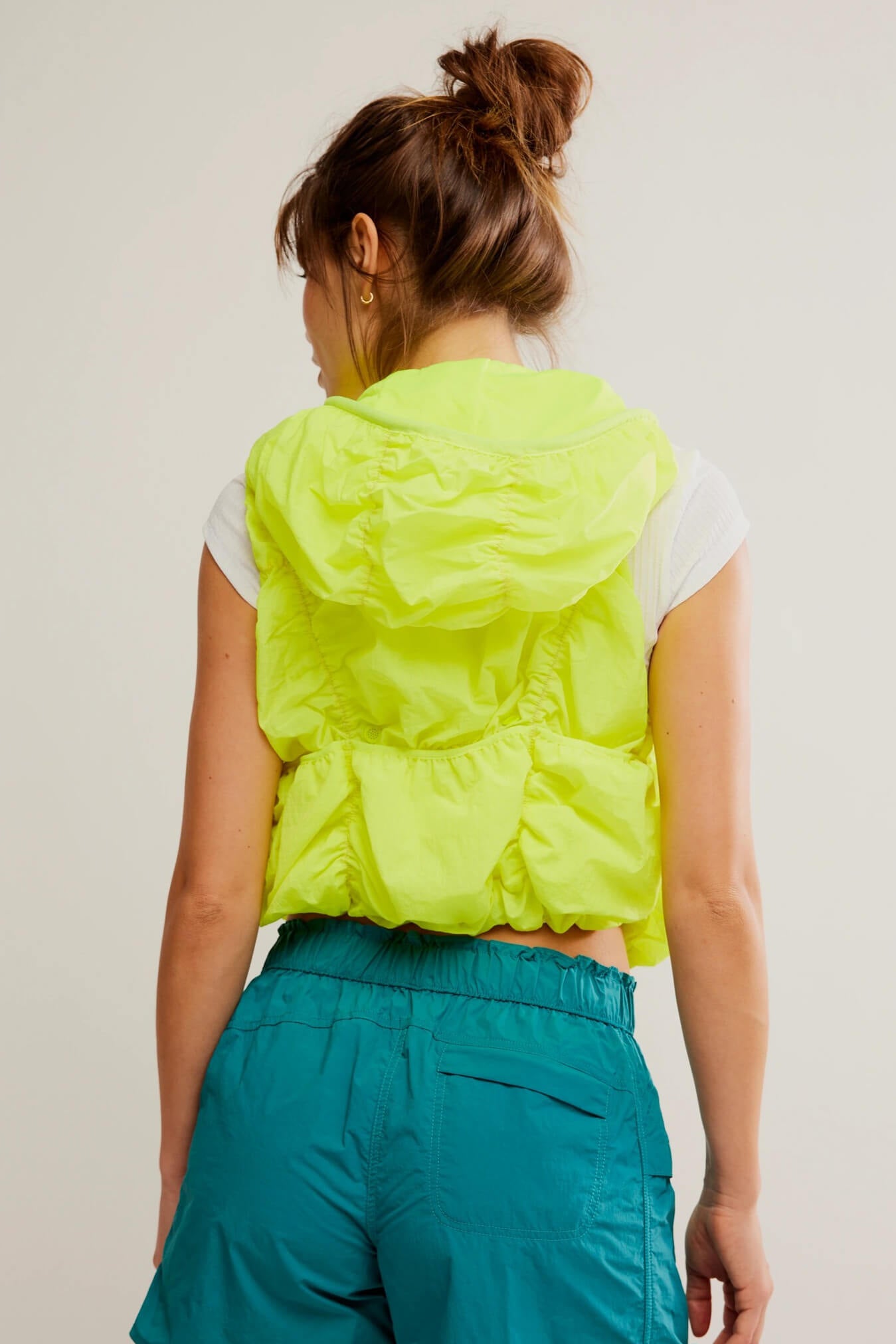 Free People light packer hiker vest in highlighter yellow