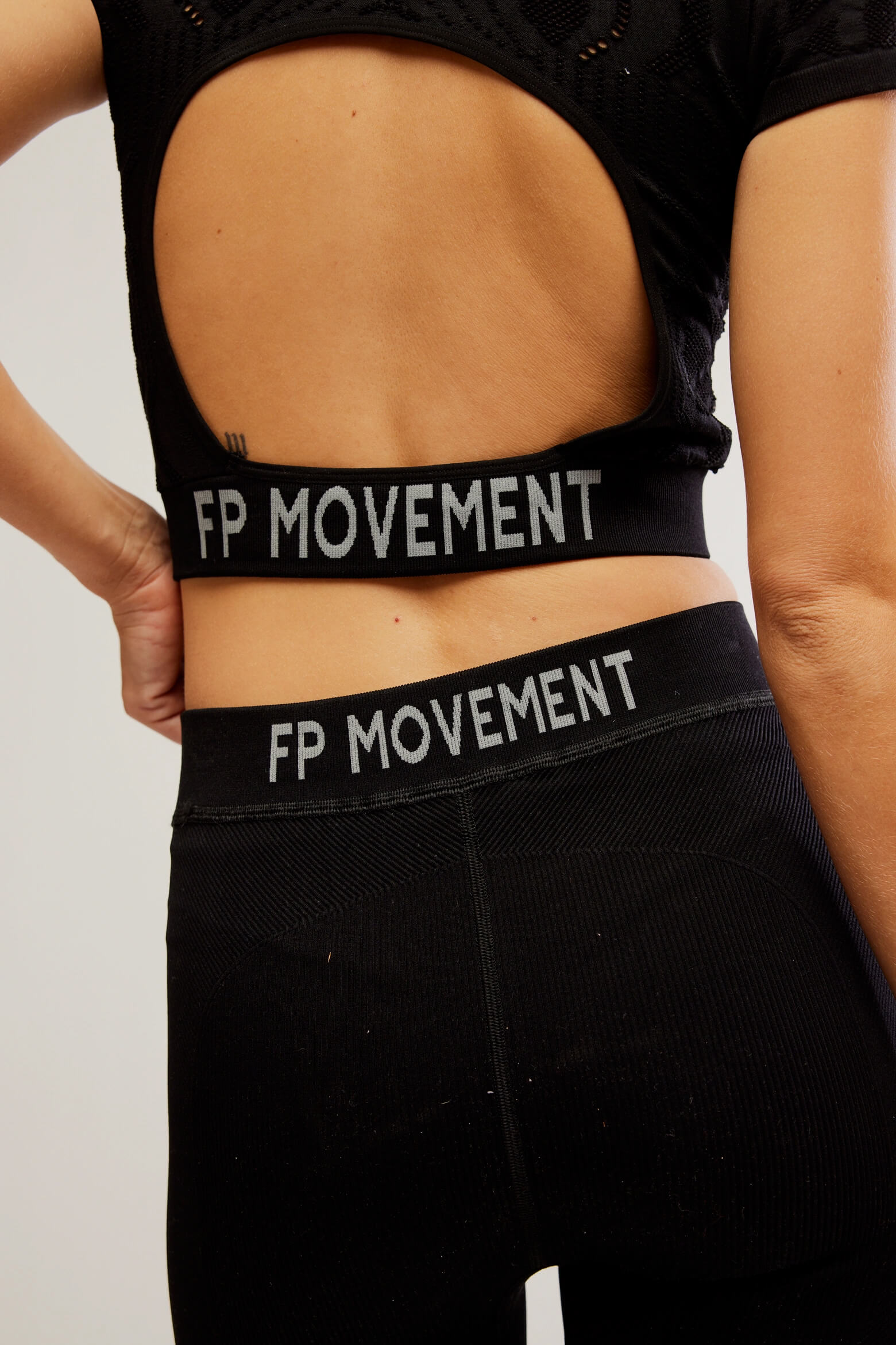 Free People Run The Distance Baby Tee in black combo