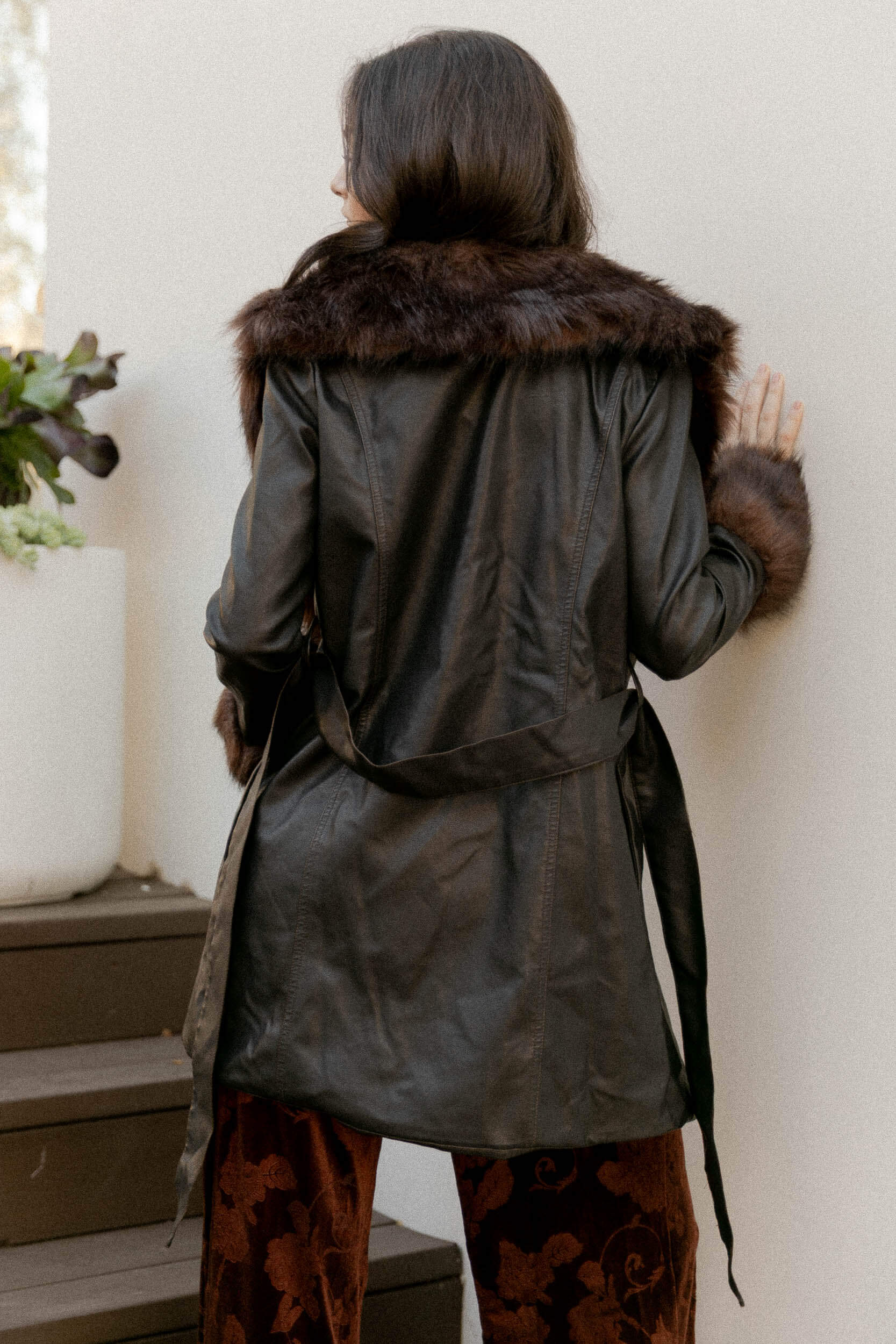 Women's black leather jacket with tie waist