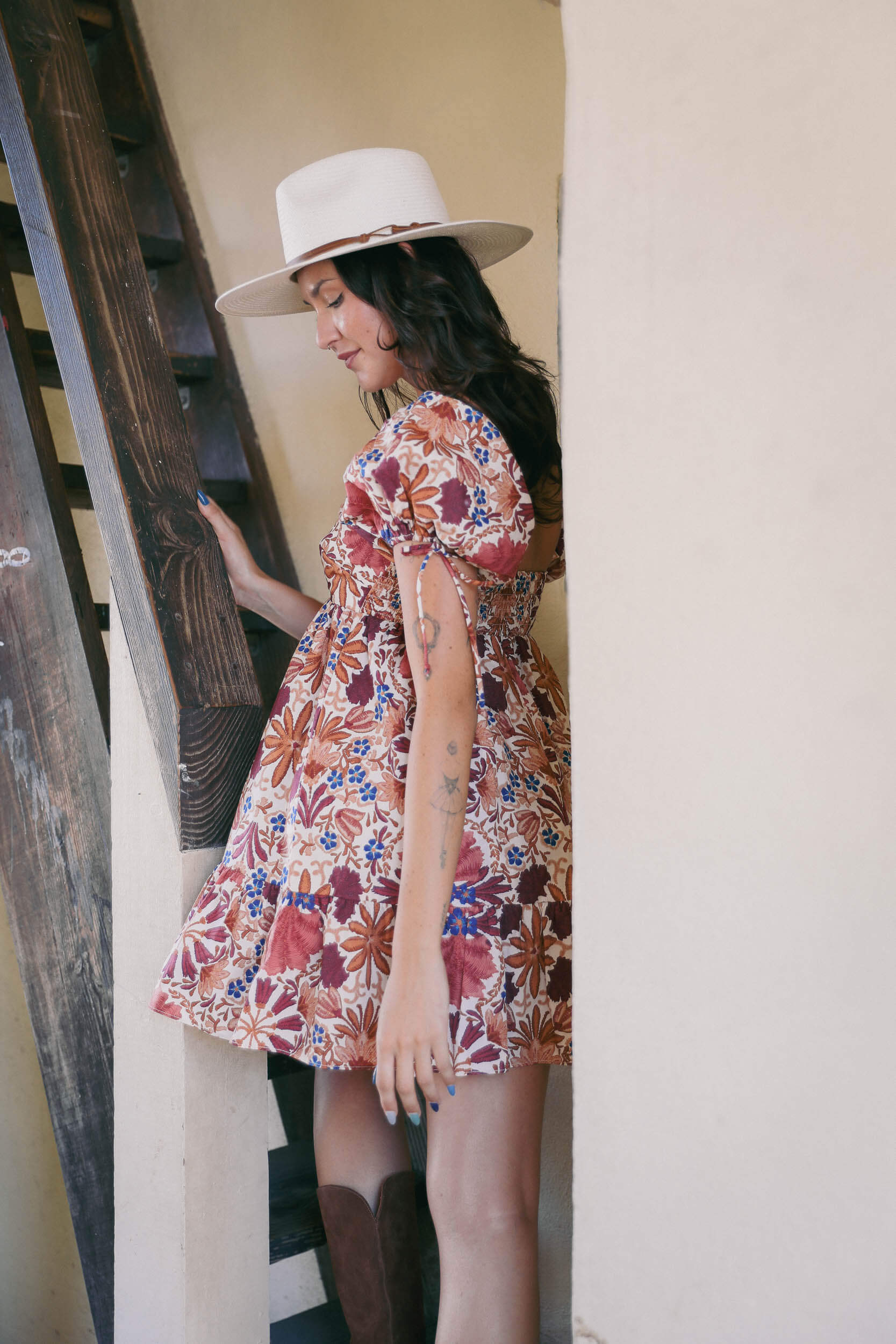 Womens puff sleeve mini dress with warm toned print all over