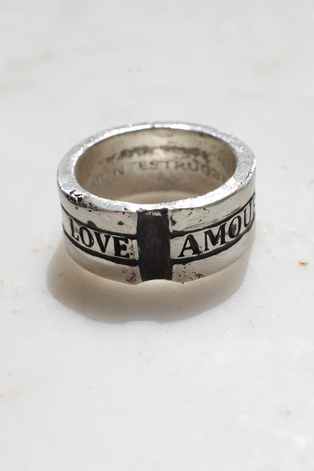 Montestruque love amour ring in sterling silver ring. Shop Montestruque jewelry today. Featuring handcrafted jewelry, historic jewelry styles, Sustainable Practices and a love of nature, shop medieval themed jewelry for men and women. Coin necklaces for women. Signet rings for men. Medieval jewelry for women. Medieval jewelry for men. Zodiac jewelry for women. Magic jewelry. Fantasy jewelry. Nature jewelry for women. Moon and stars jewelry. Unisex jewelry.