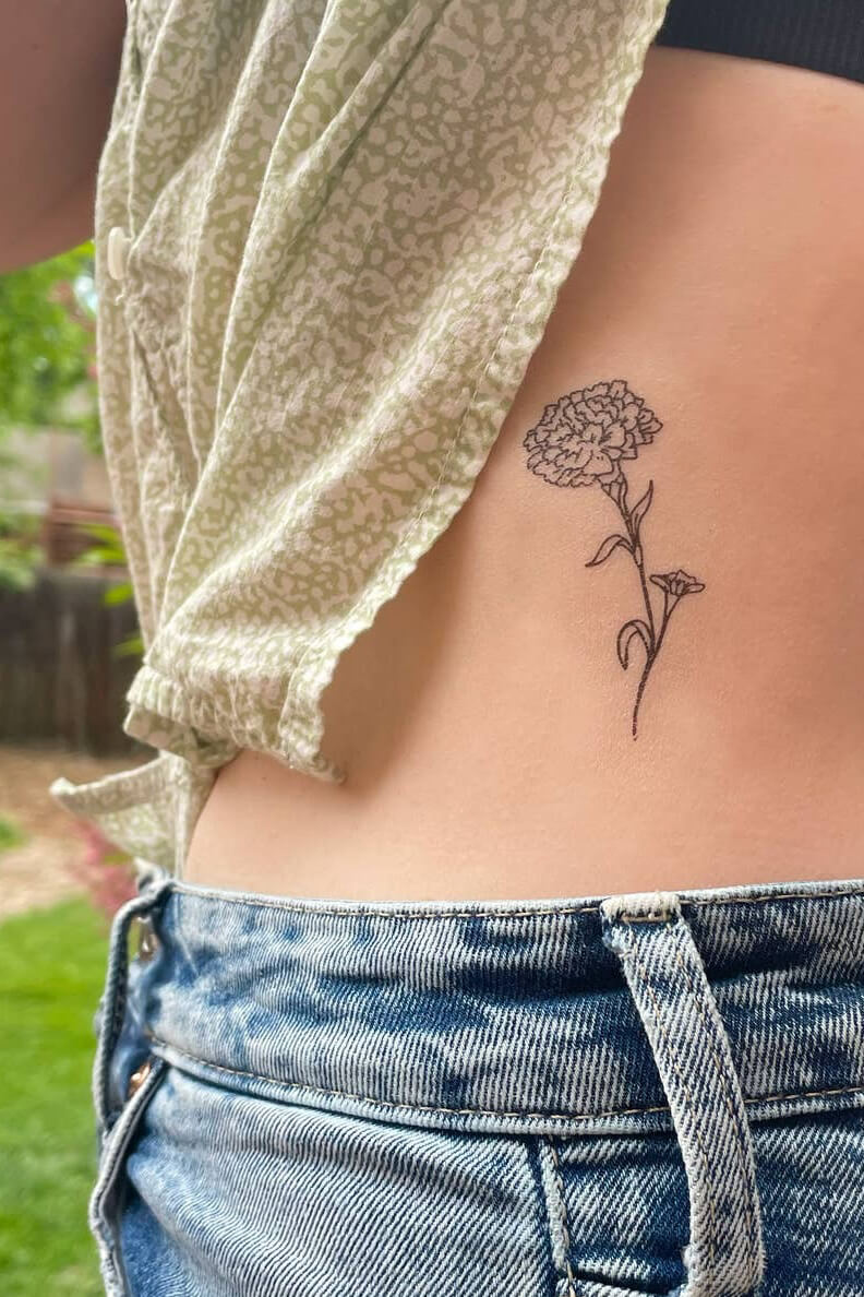 Saint & Company October birth flower tattoo