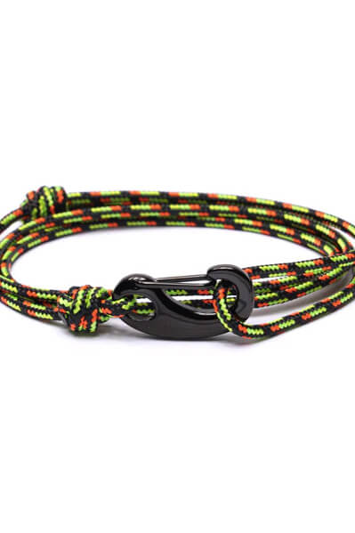 Dog collar with colorful pattern and black clasp on a white background
