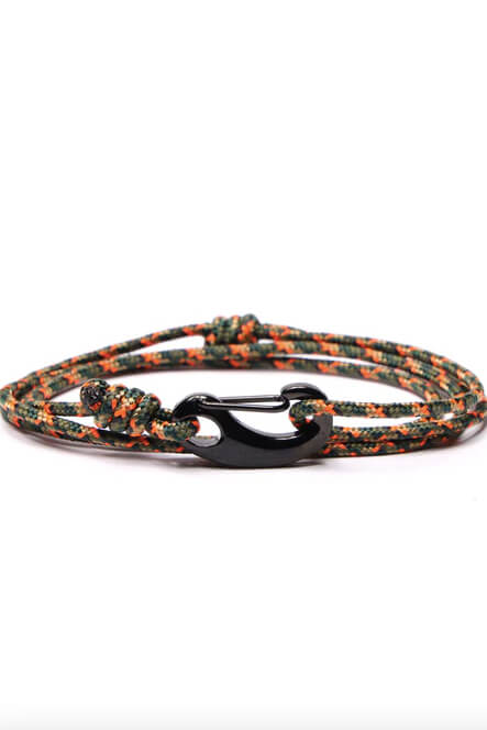Bracelet with a black clasp on a white background