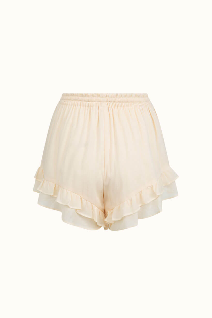 Spell Teodora short in white smoke