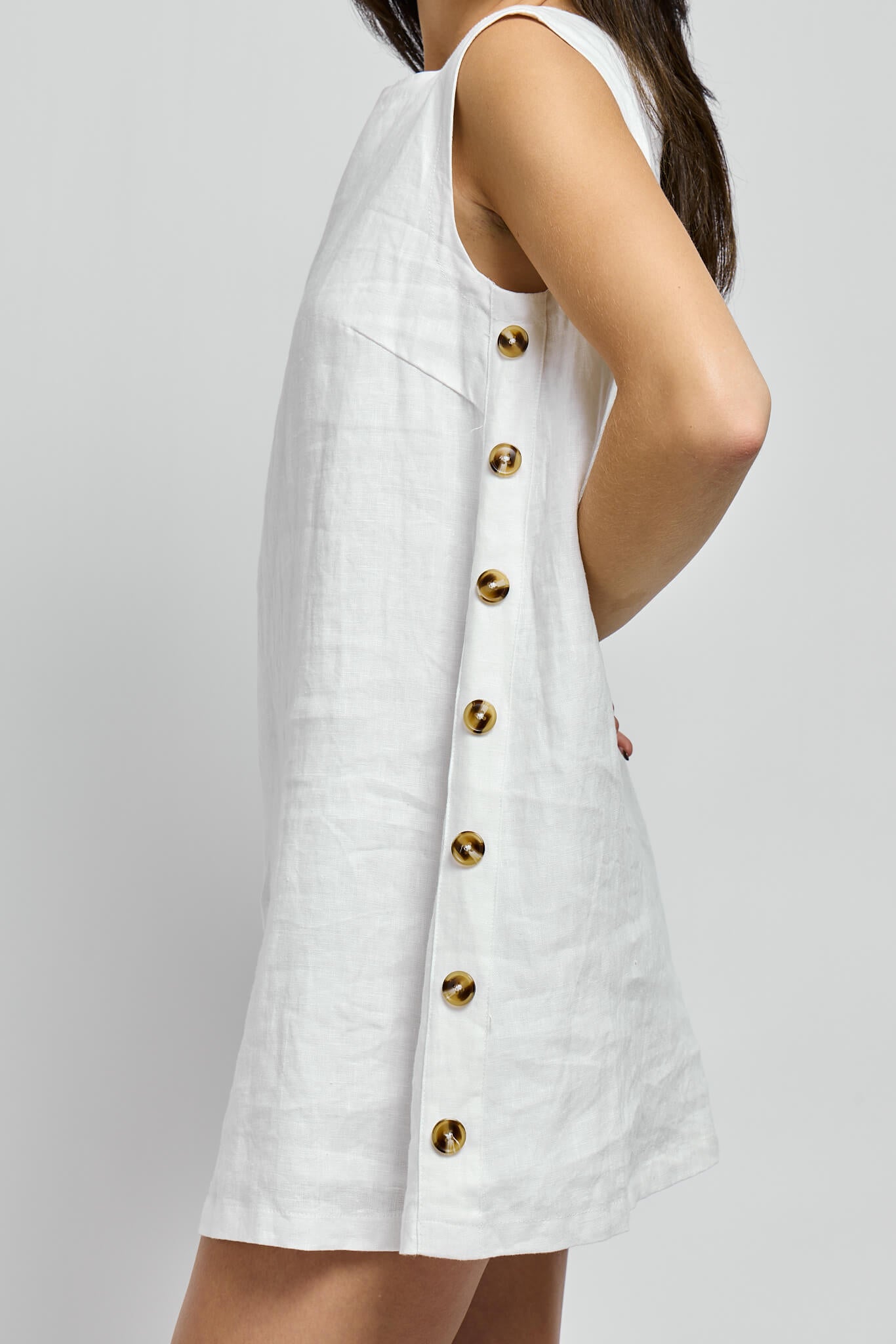 Womens white linen mini dress with side button details