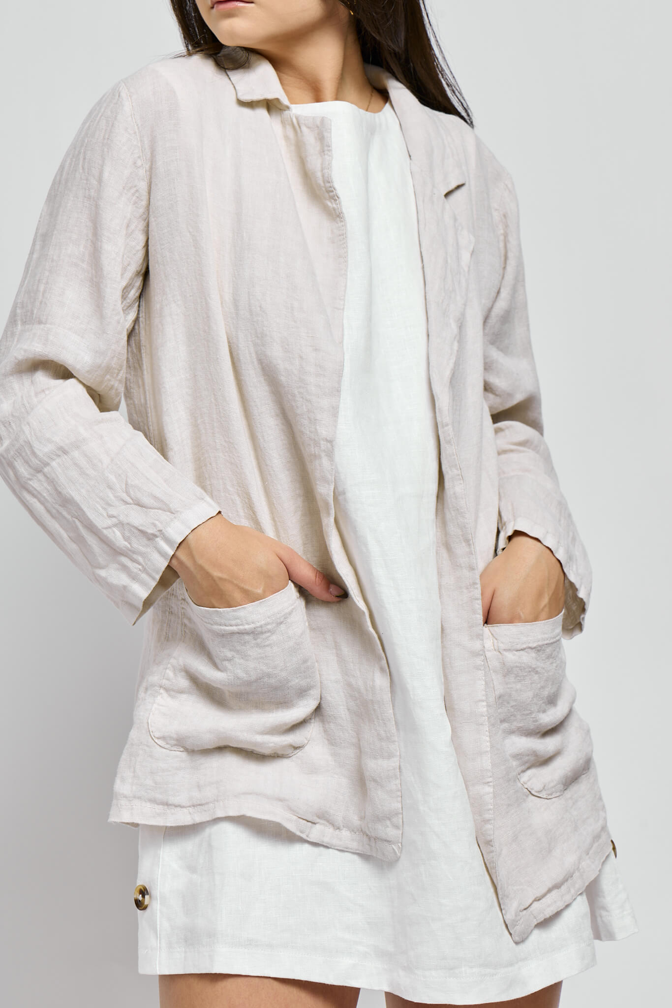 Womens beige light weight linen blazer with two front pockets