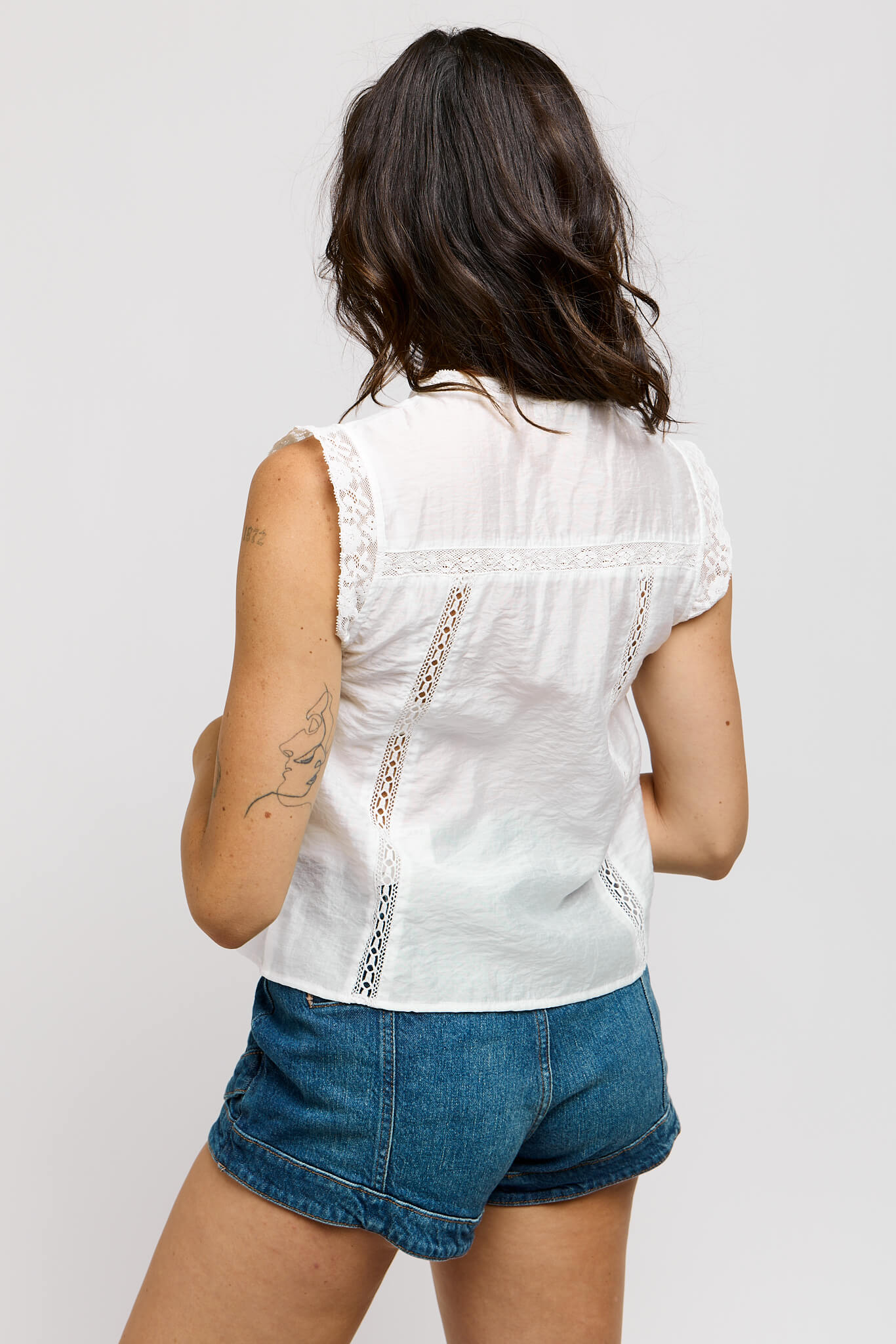 Womens white dainty top with lace detailing