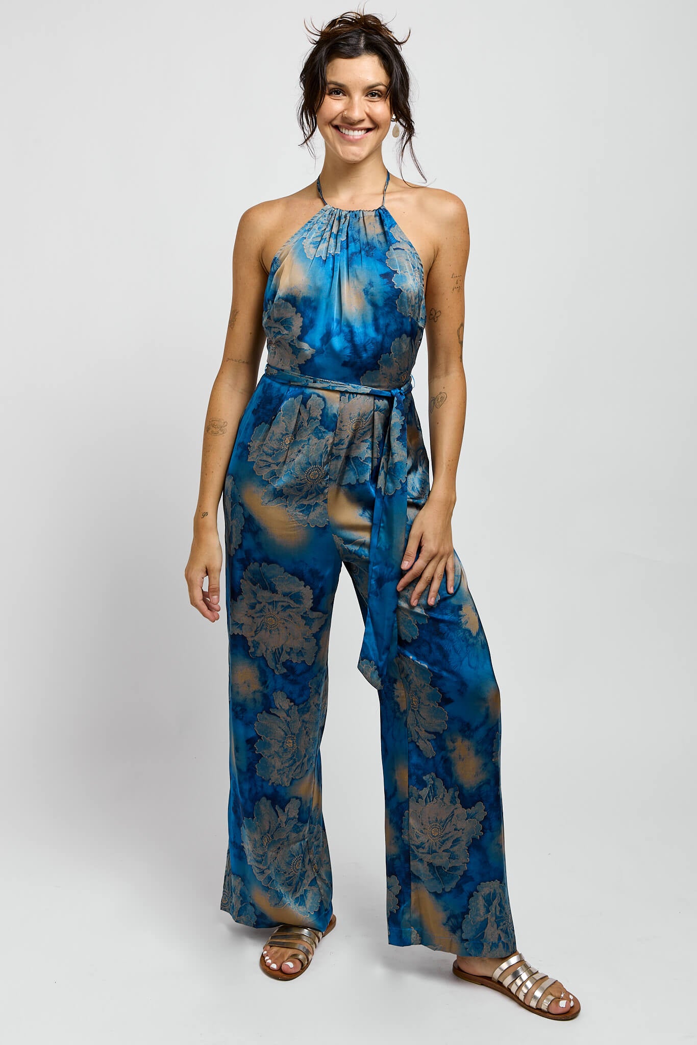 Womens jumpsuit with gold print throughout