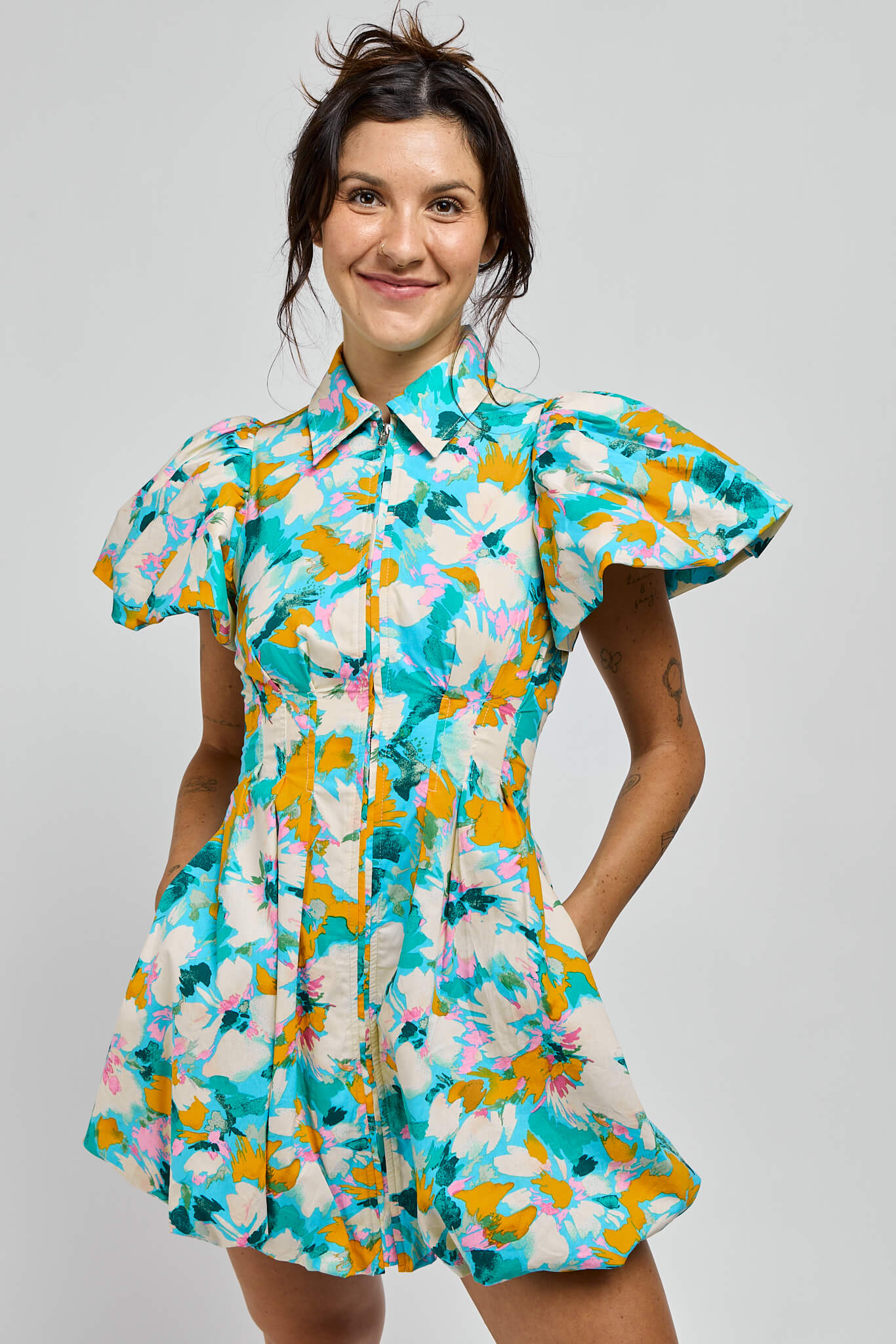 Womens floral zip up dress with collar and puff sleeves and buttom hem