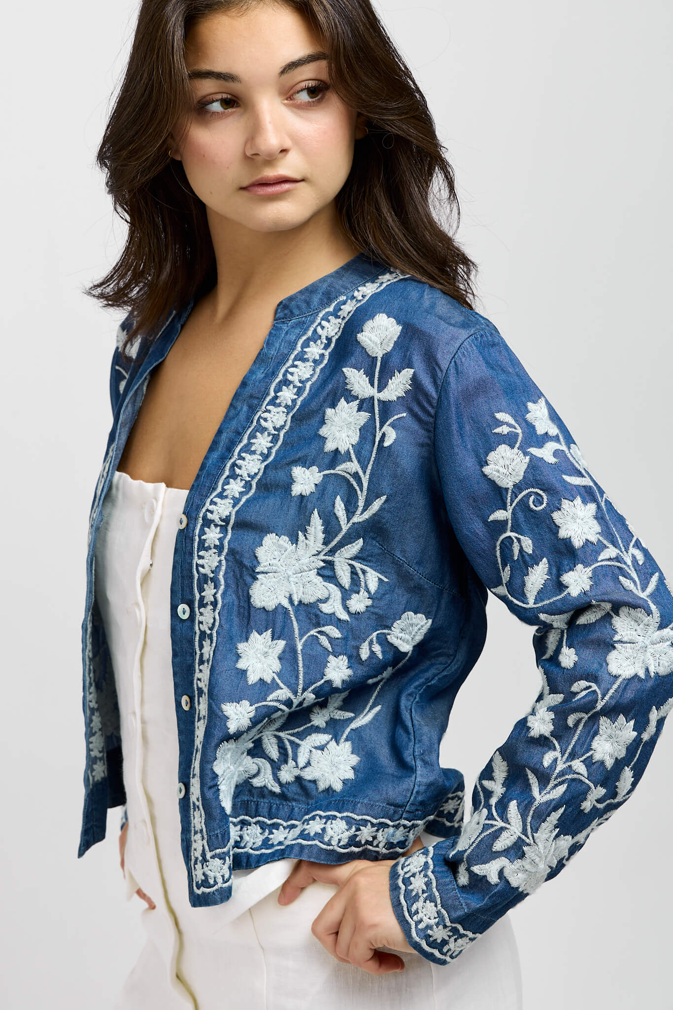 Womens dark wash jacket with white embroidery