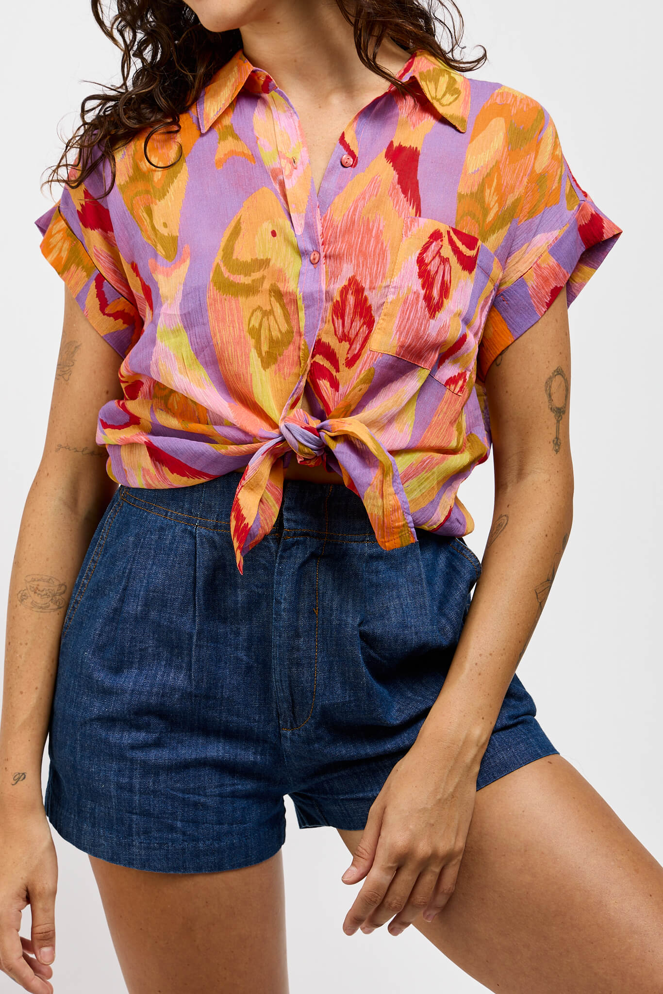 Womens short sleeve with cuffed sleeves and front pocket detail