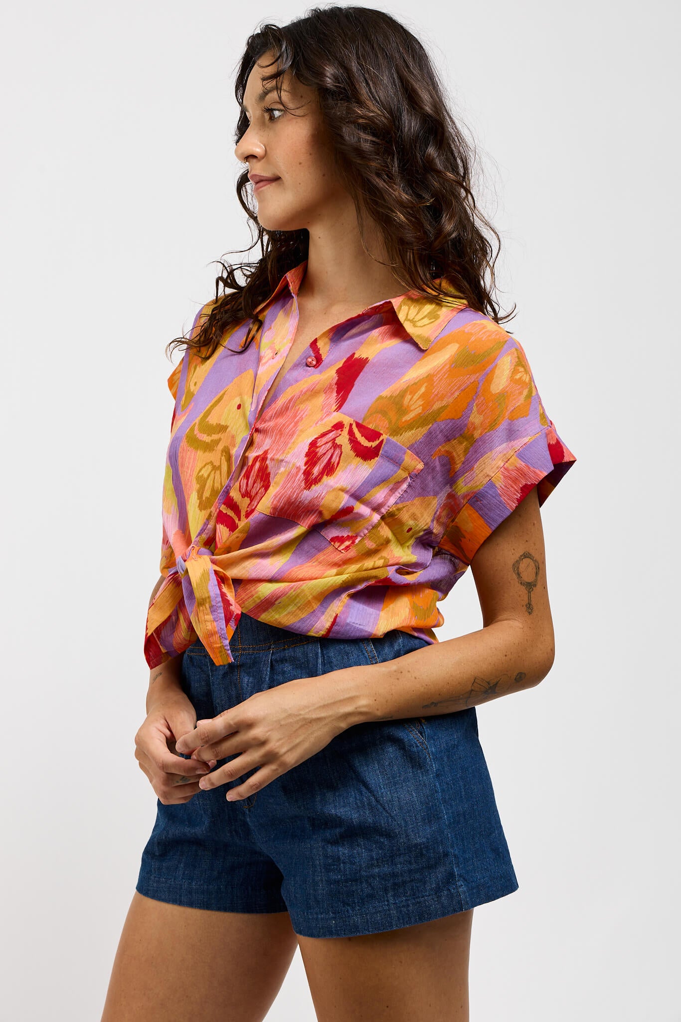 Womens vibrant printed short sleeve buttonup with collar