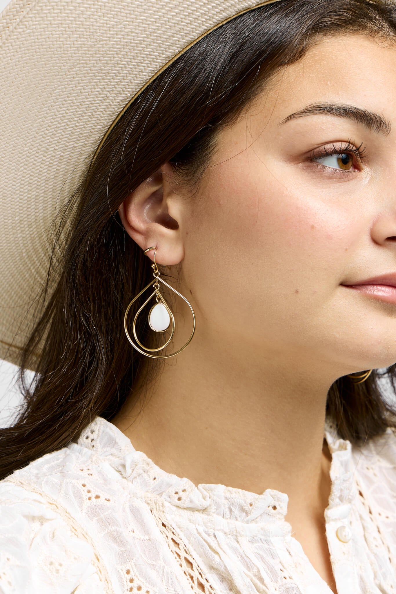 Womens Gold and white teardrop style earrings