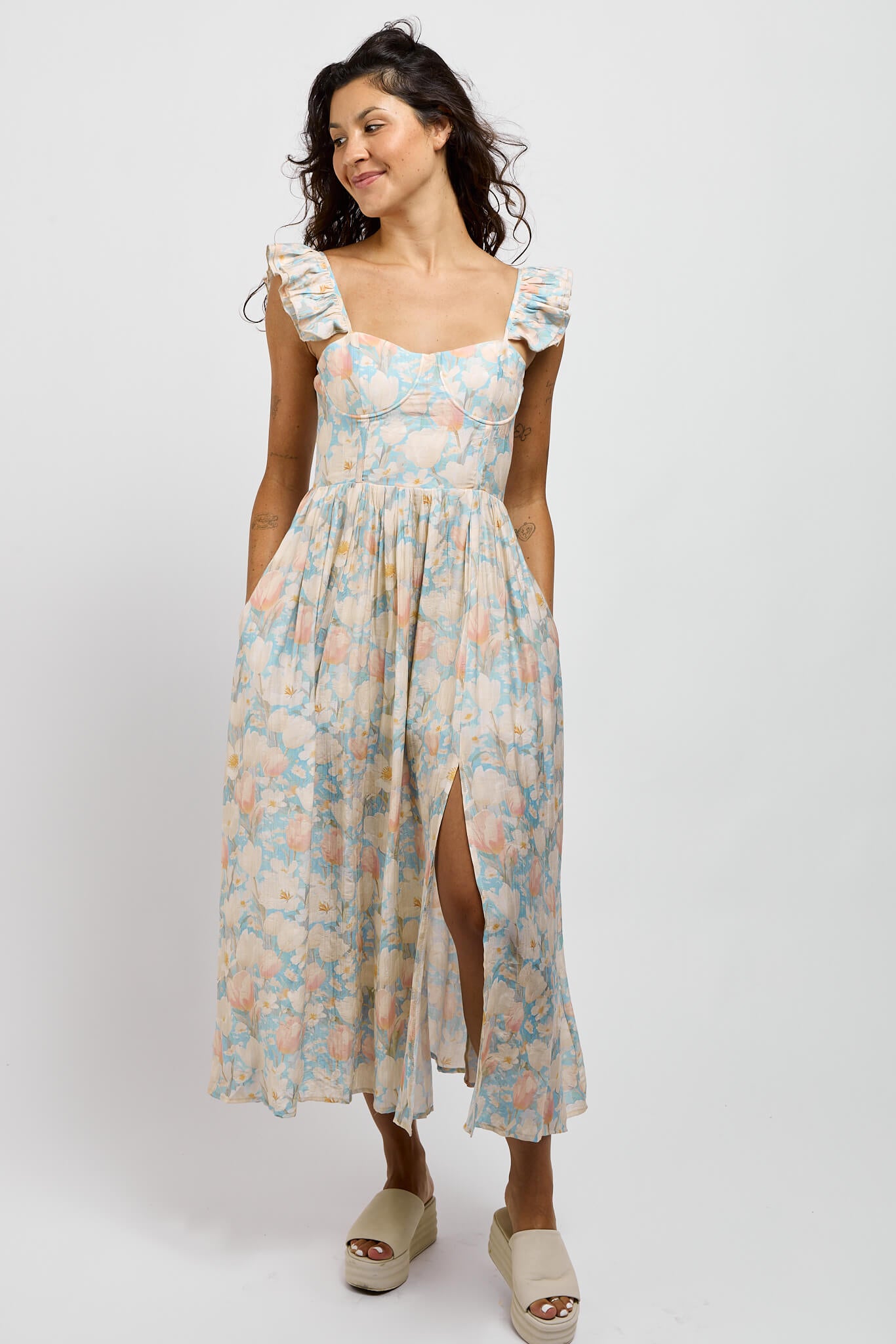 Womens blue and pastel floral print throughout and mid thigh slit
