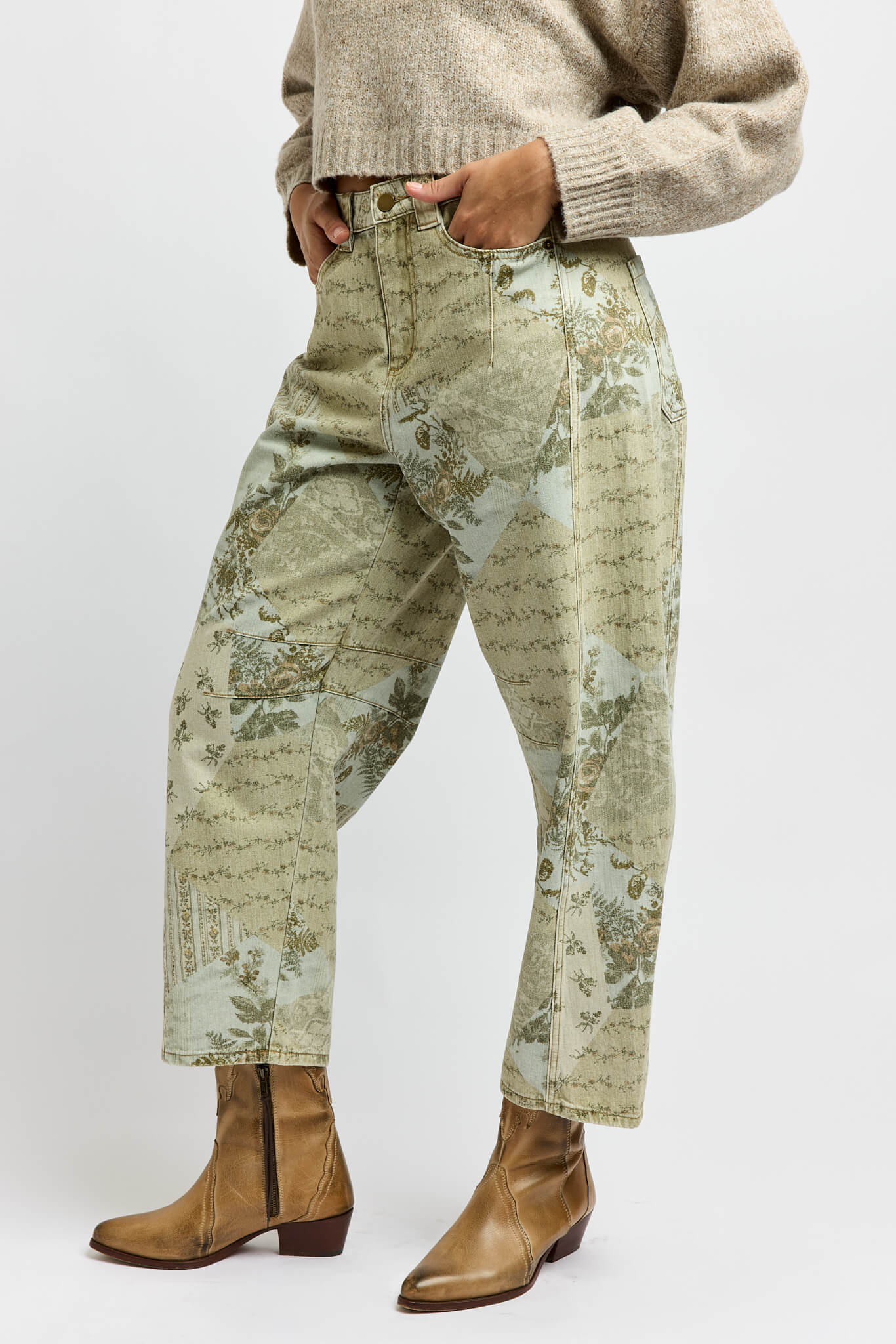 Womens barrel cut jeans with a floral print throughout
