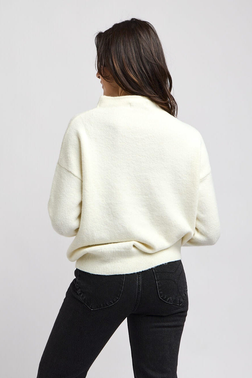 Womens smocked neck sweater with a relaxed fit