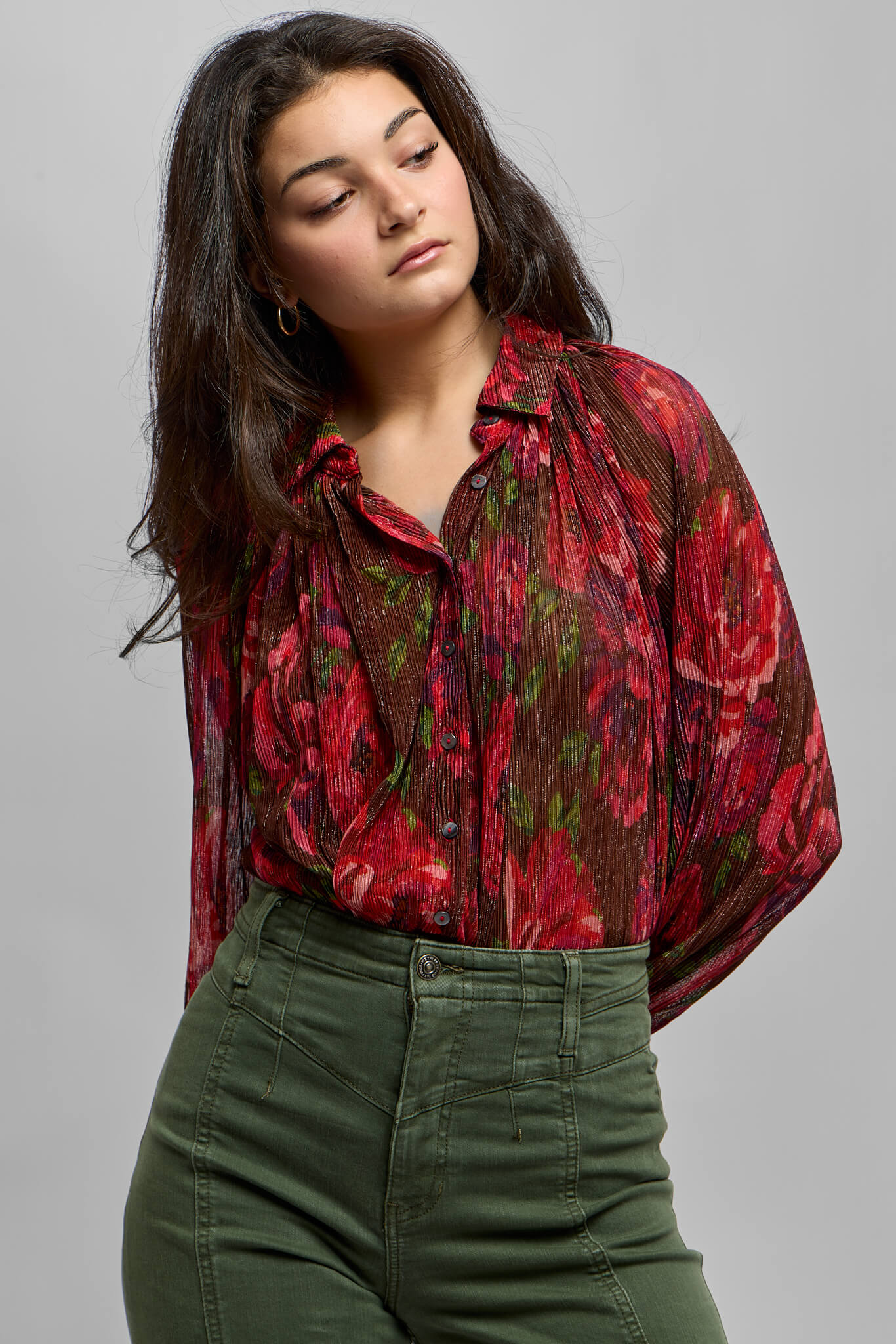 Womens sheer top with tiny gold detail throughout and red floral print