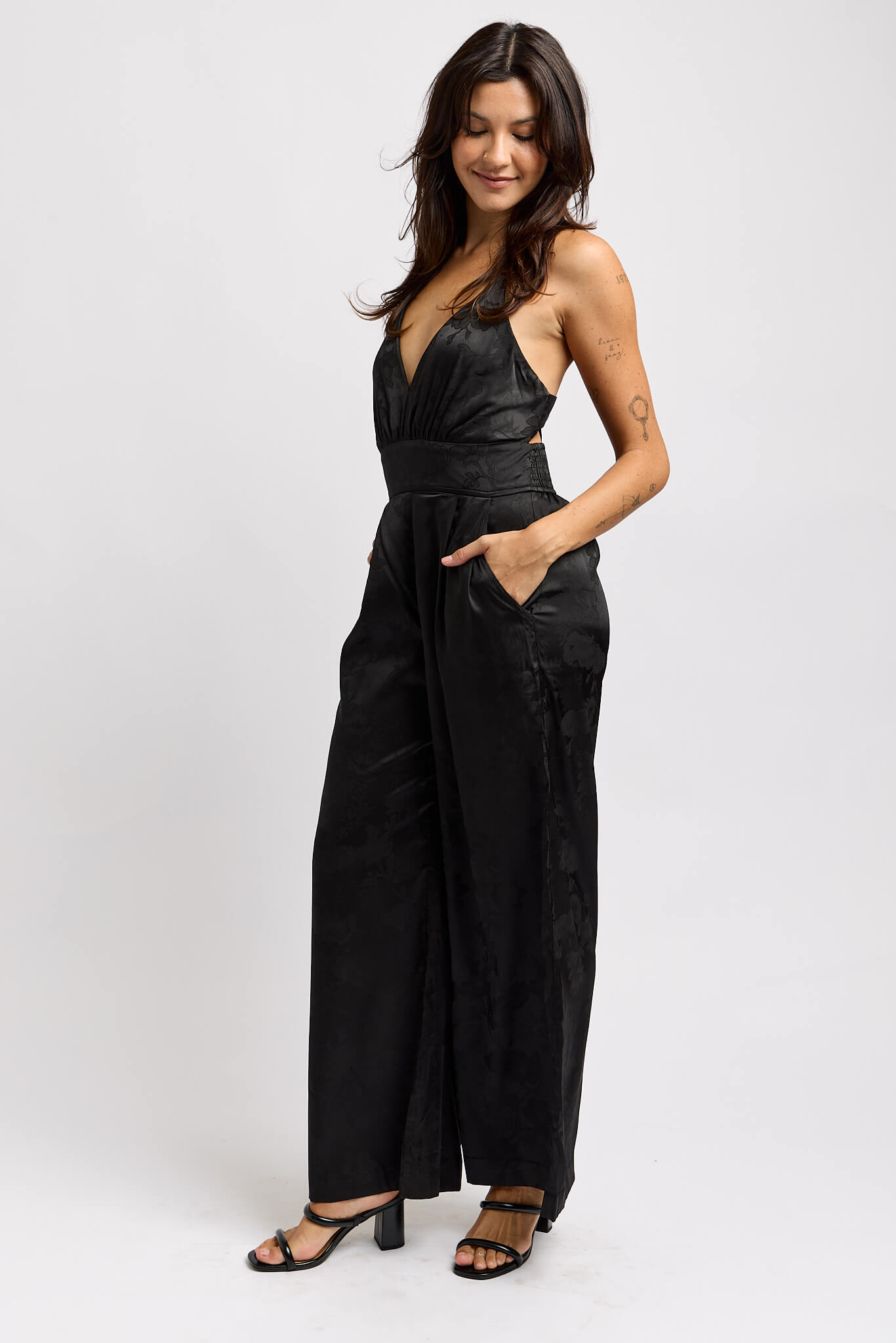 Womens black spaghetti strap jumpsuit with pockets