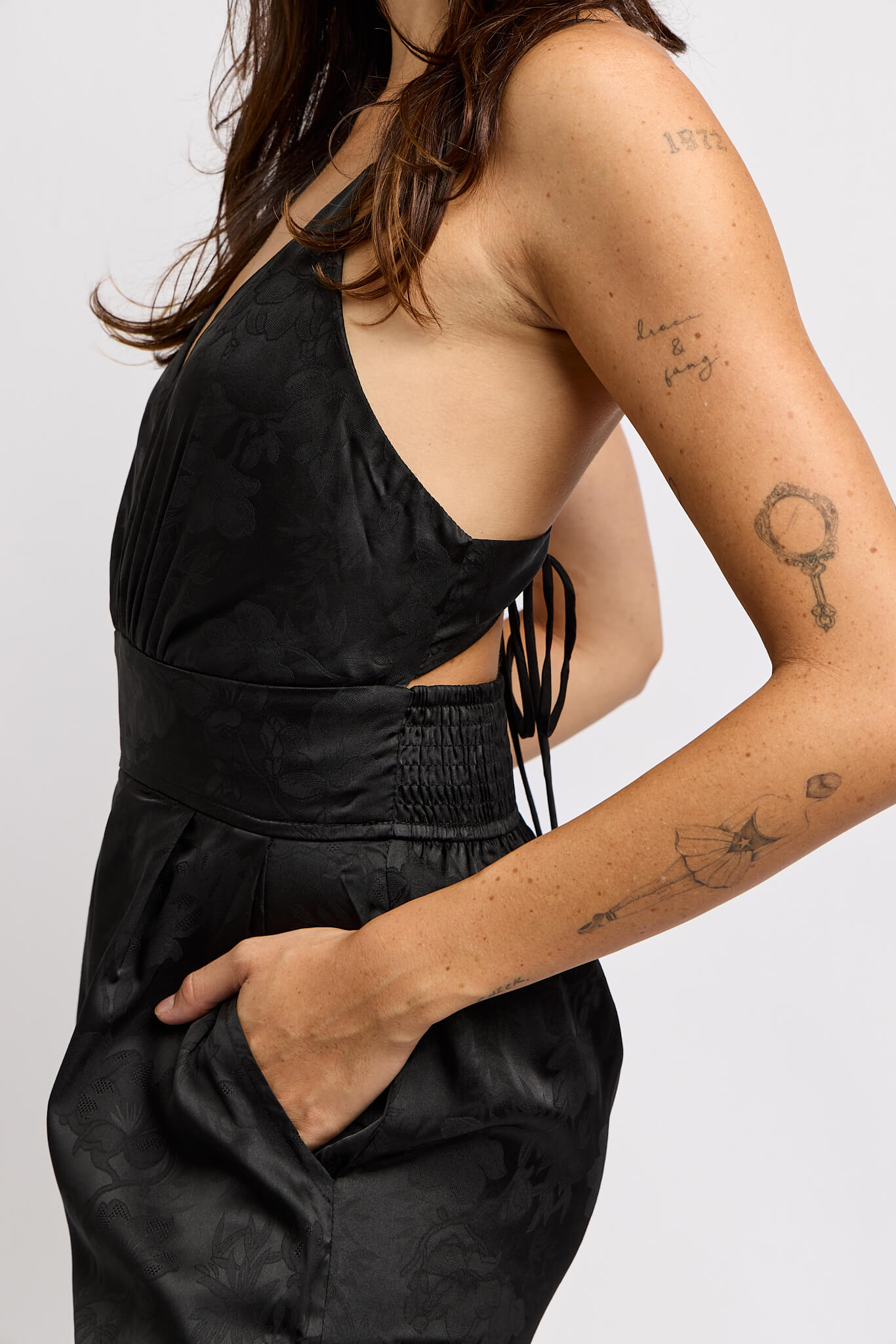 Womens open back jumpsuit with cutouts and stretchy back band