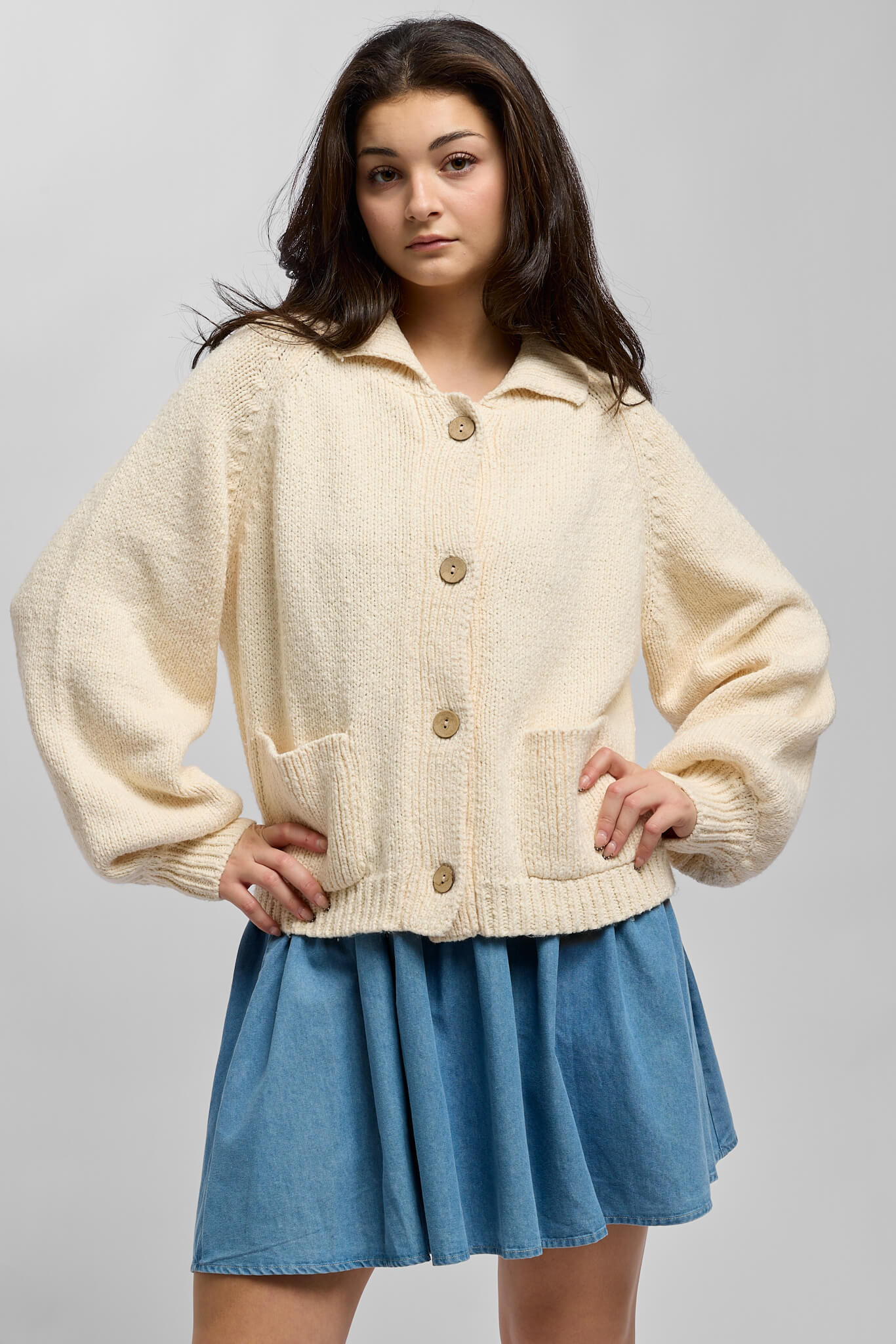 Womens knitted buttonup cardigan in an ivory color