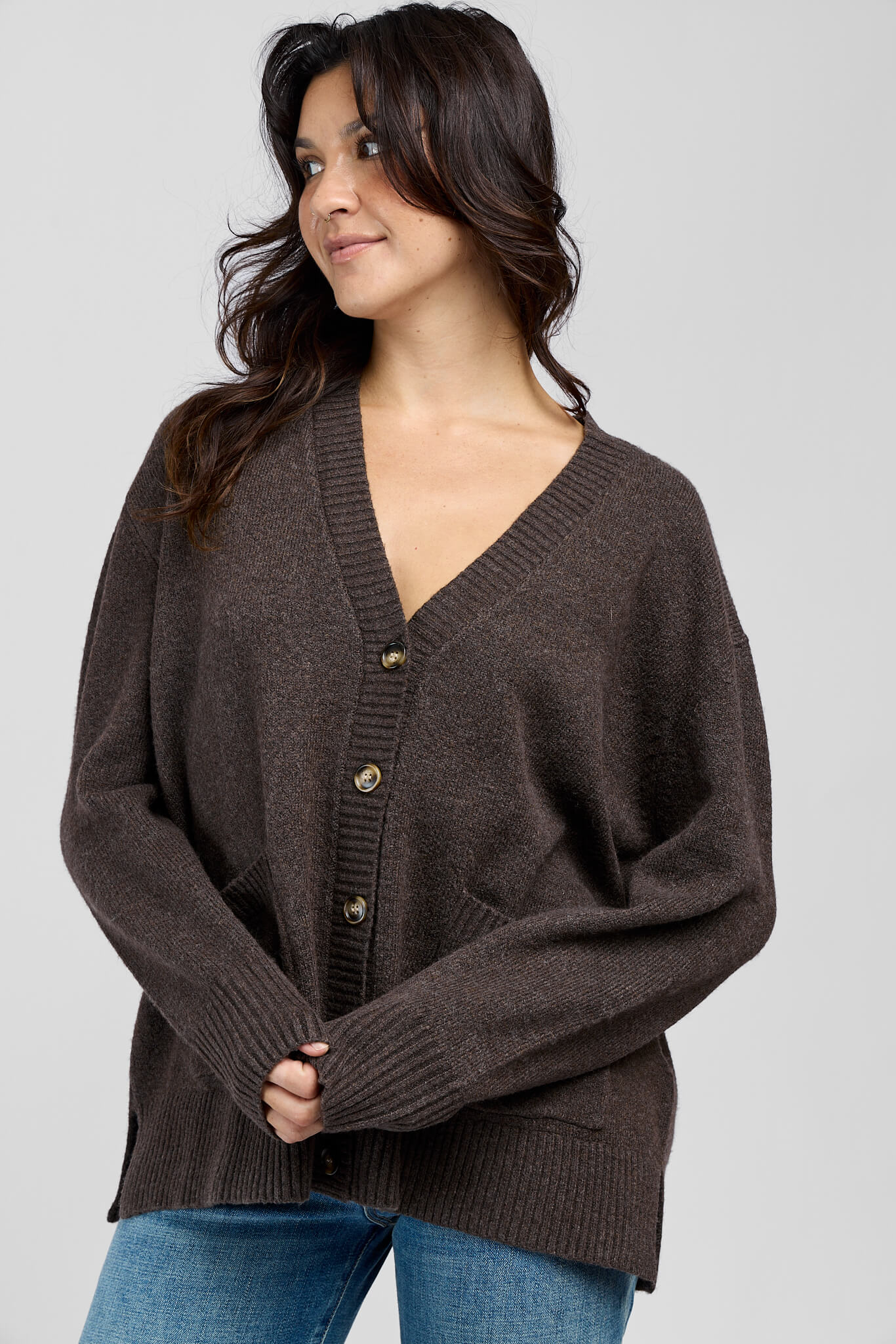 Womens brown cardigan with full sleeves and button closure along front