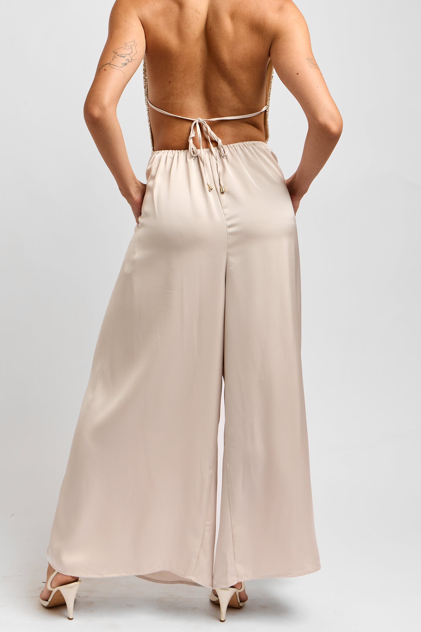Womens wide leg backless jumpsuit with dainty back tie
