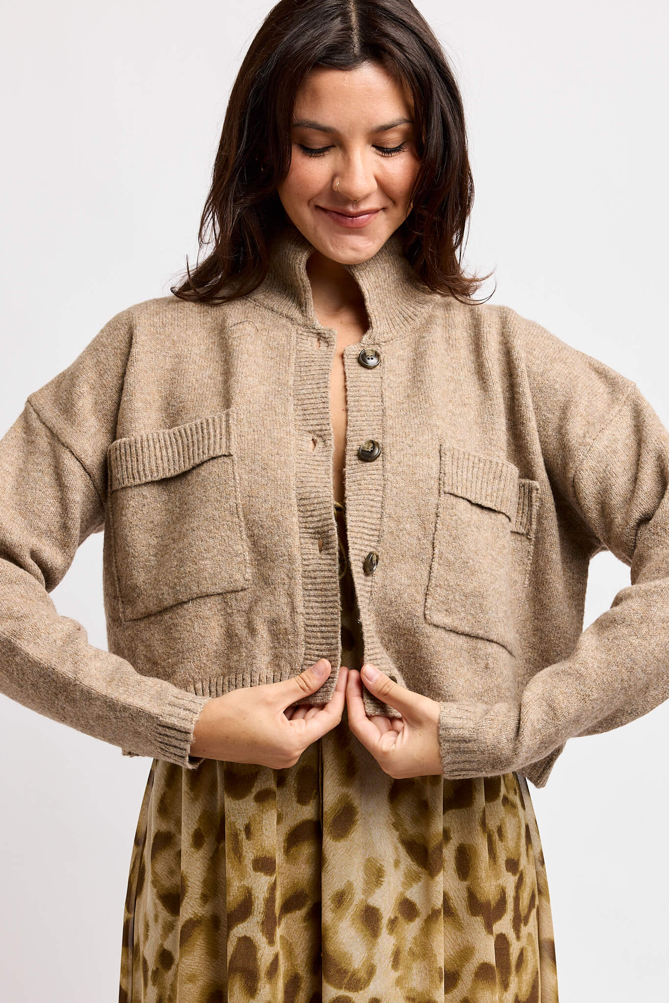 Womens brown knit cardi with buttons along front and oversized front pockets