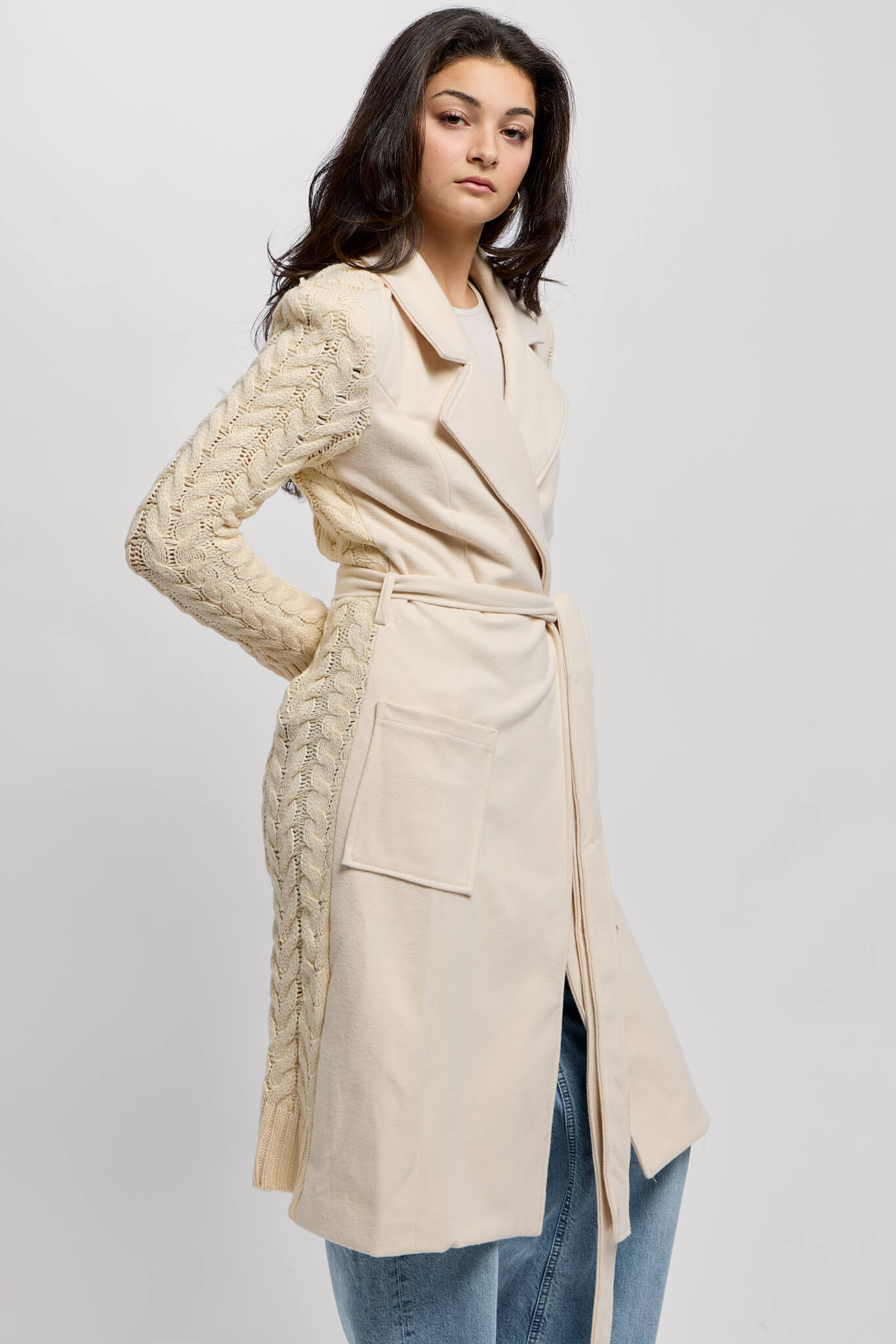 Womens coat with natural hue knit back and textured material front