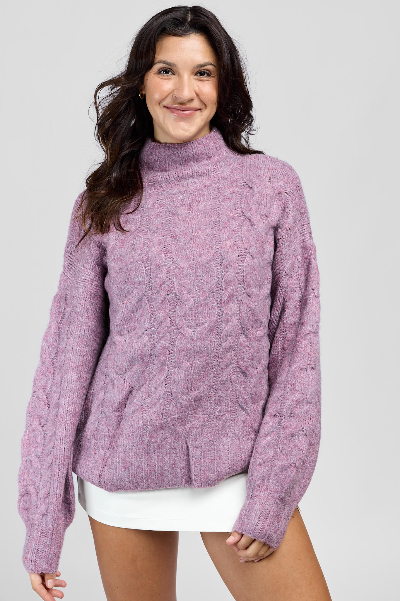 Womens lilac colored full length cableknit sweater with high neck