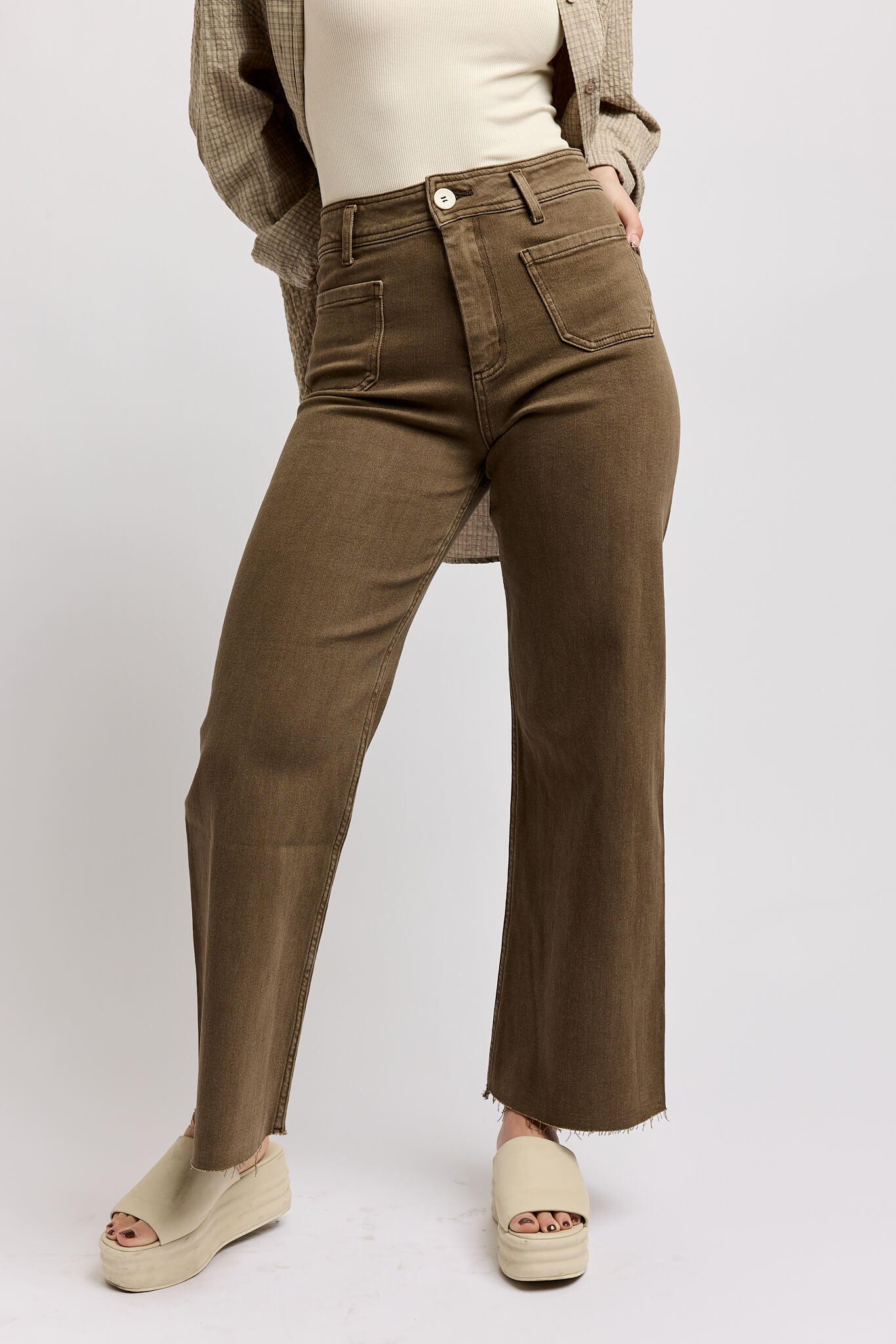 Womens wide leg jeans with a raw hem and two front pockets