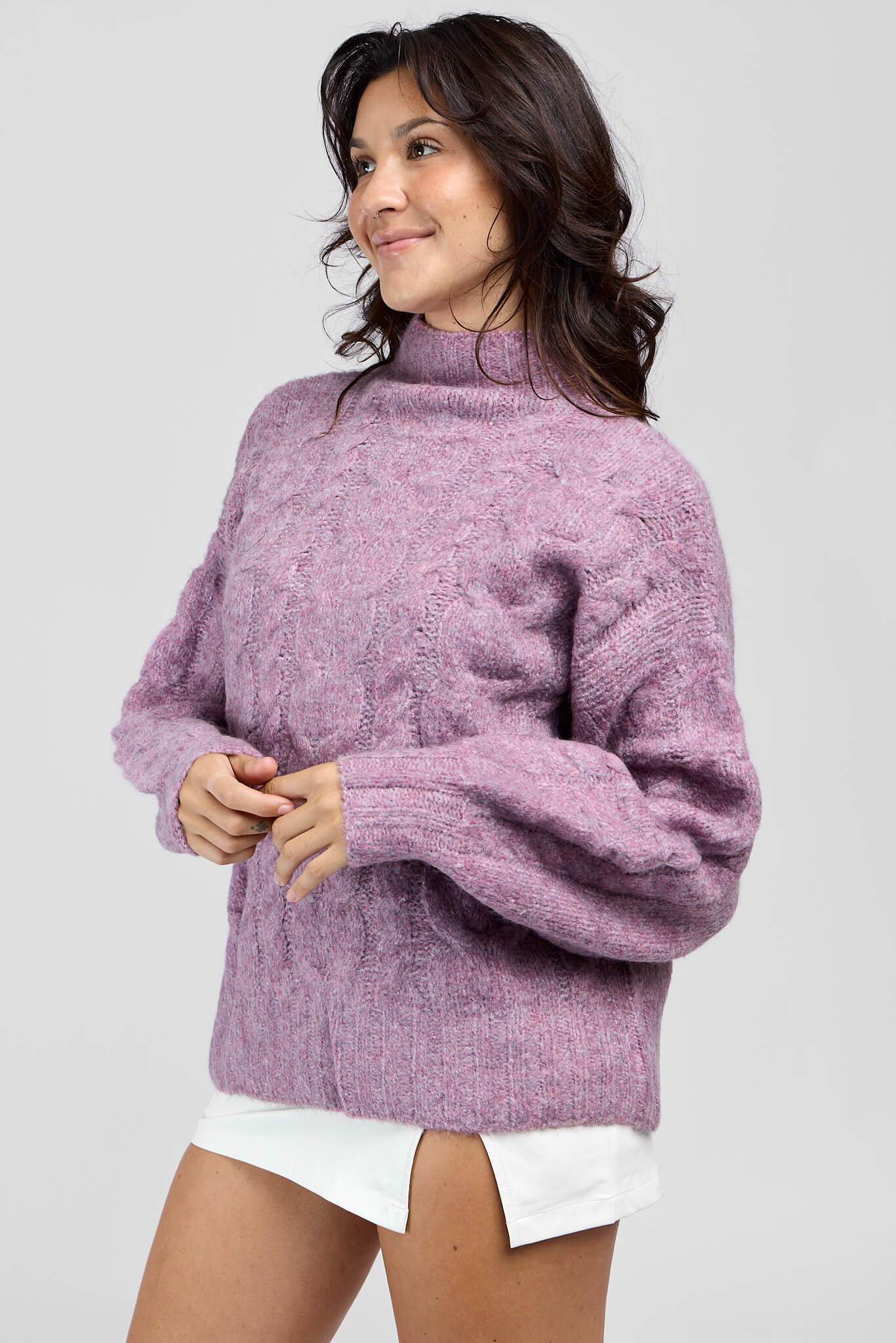 Womens sweater with a slight turtleneck and balloon sleeves