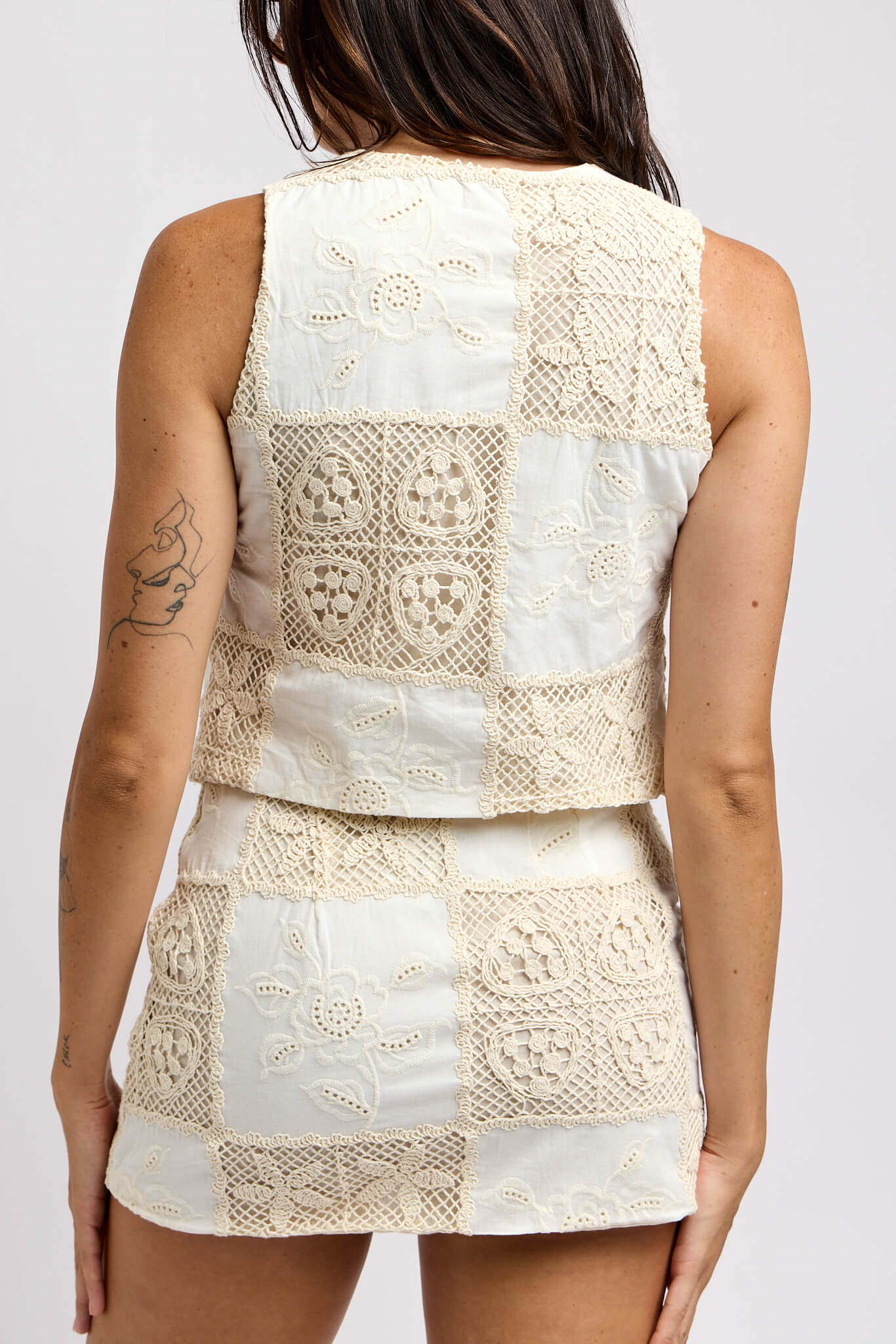 Womens ivory knit and patchwork vest top