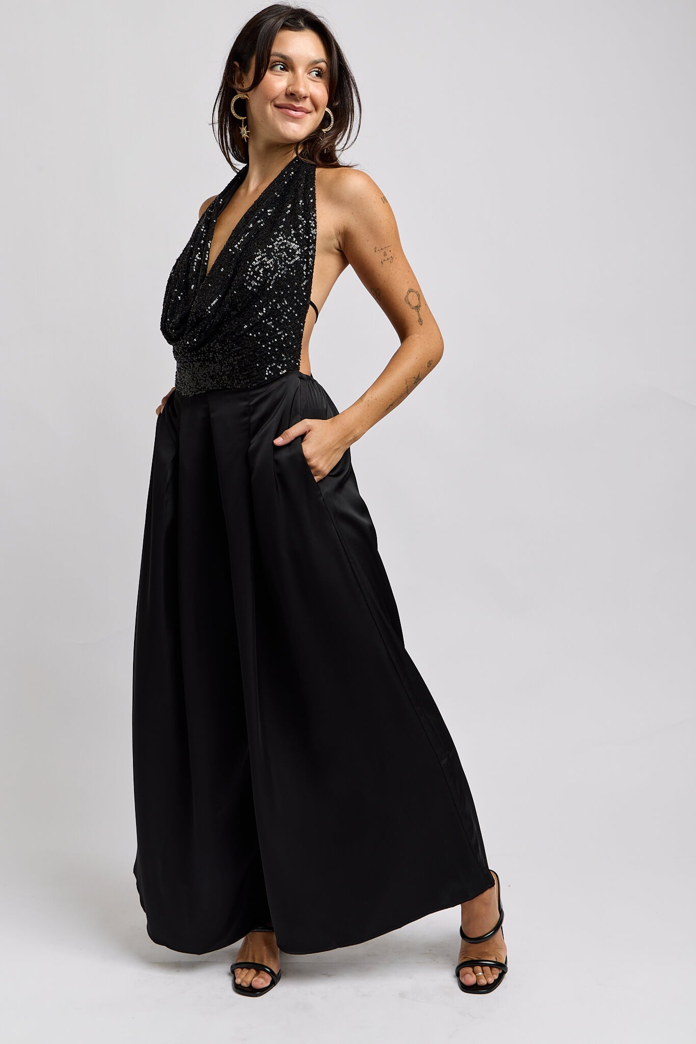 Womens black sequin halter top jumpsuit with silky wide leg pants with pockets