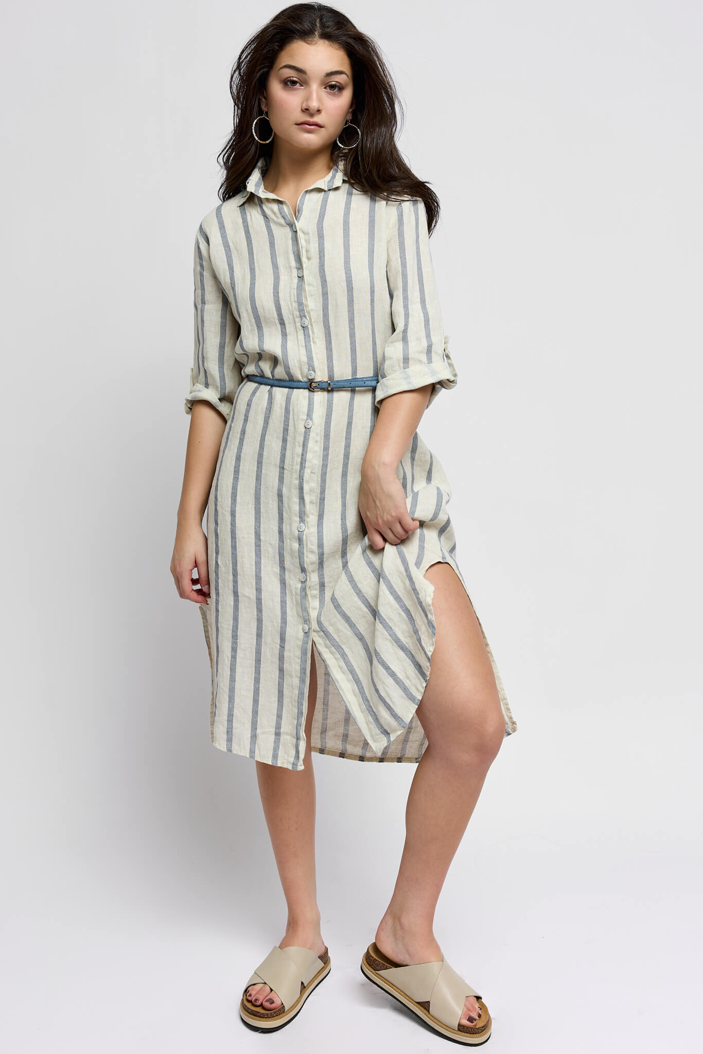 Womens ivory colored tunic with light blue vertical stripes