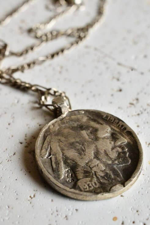 montestruque buffalo coin pendant
