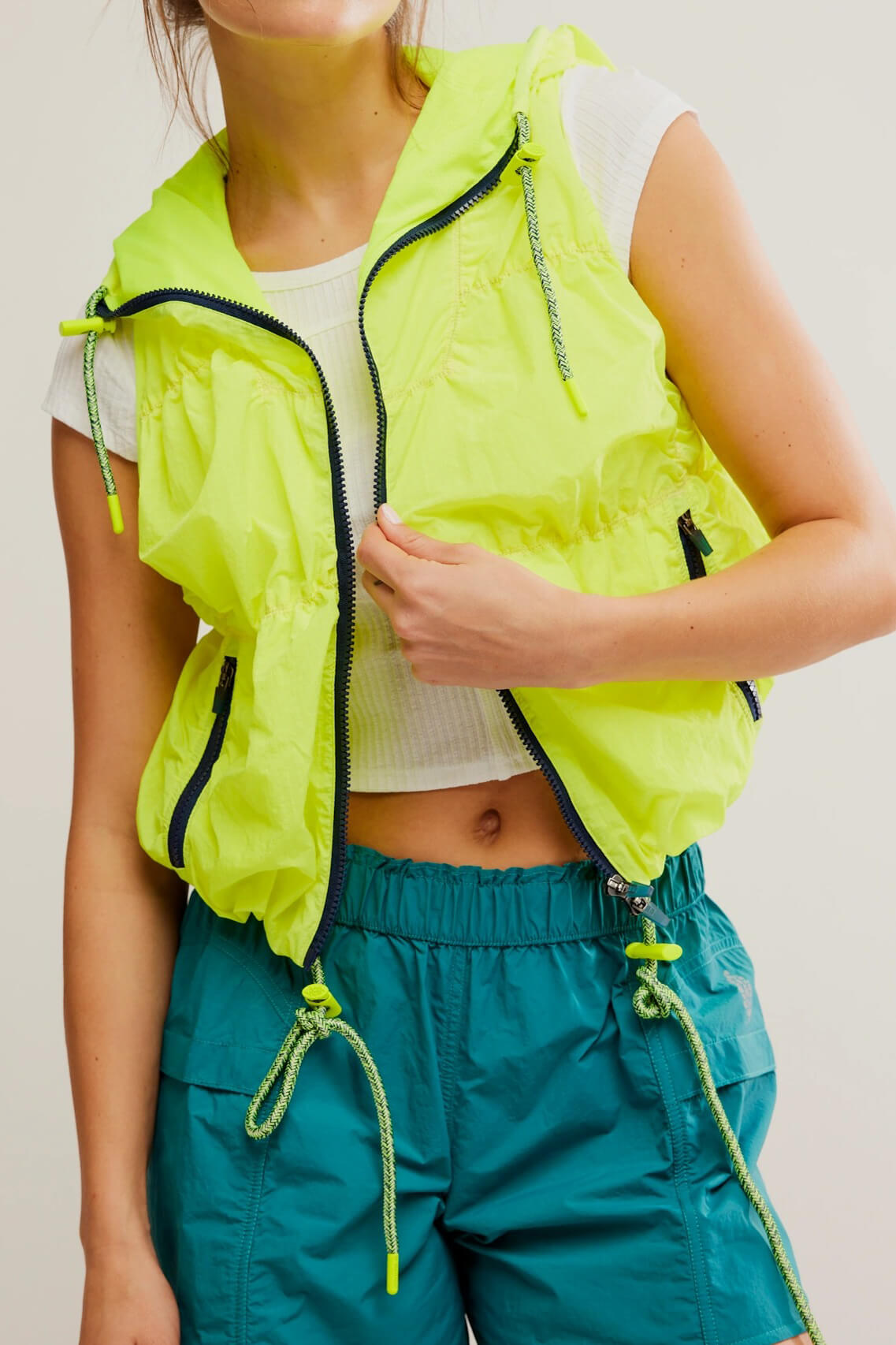 Free People light packer hiker vest in highlighter yellow