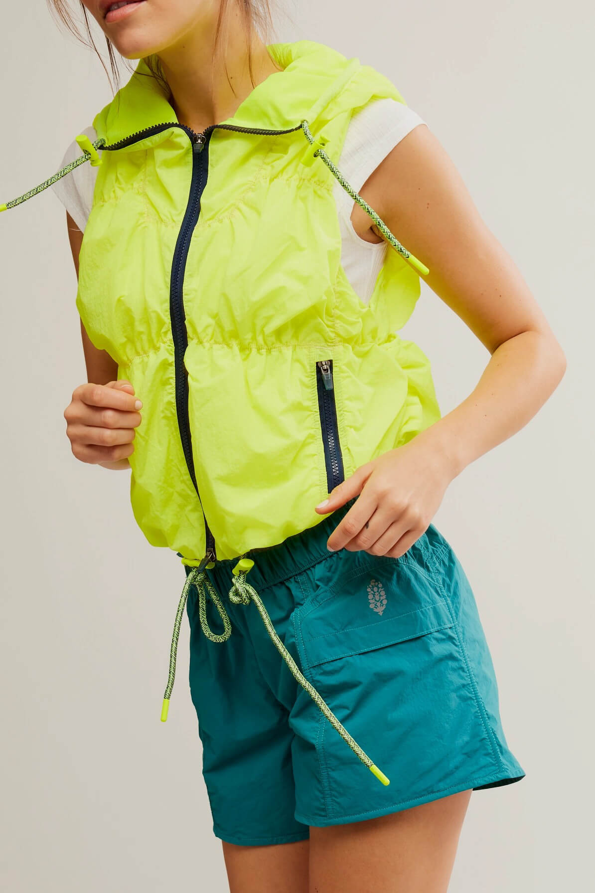 Free People light packer hiker vest in highlighter yellow