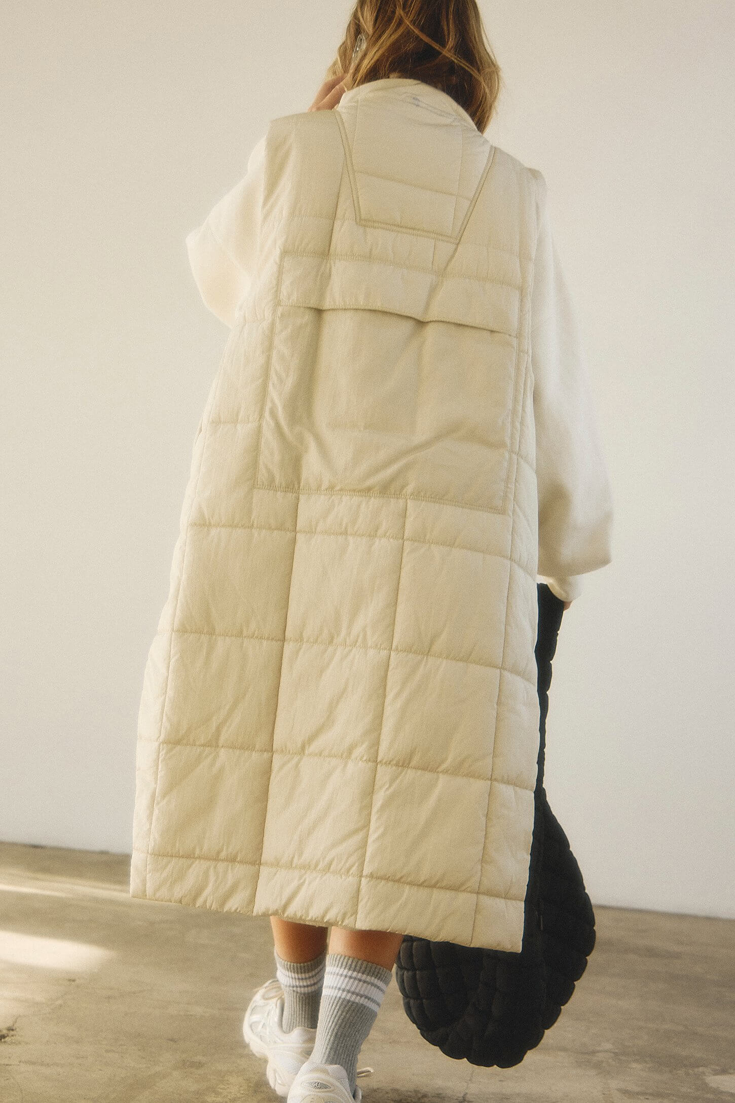 Free People On The Move Packable Vest in muted beige