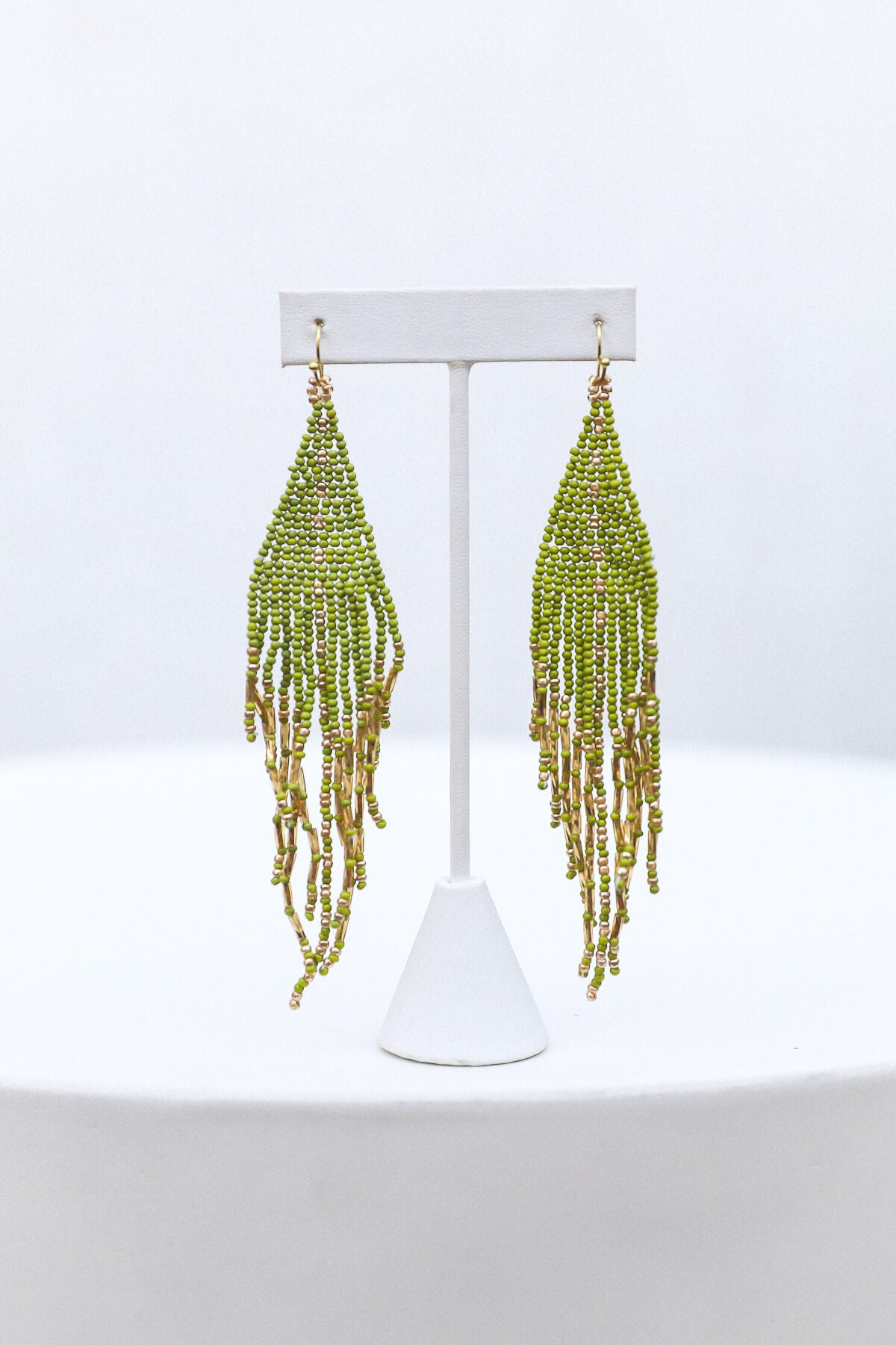 Womens green and gold beaded earrings