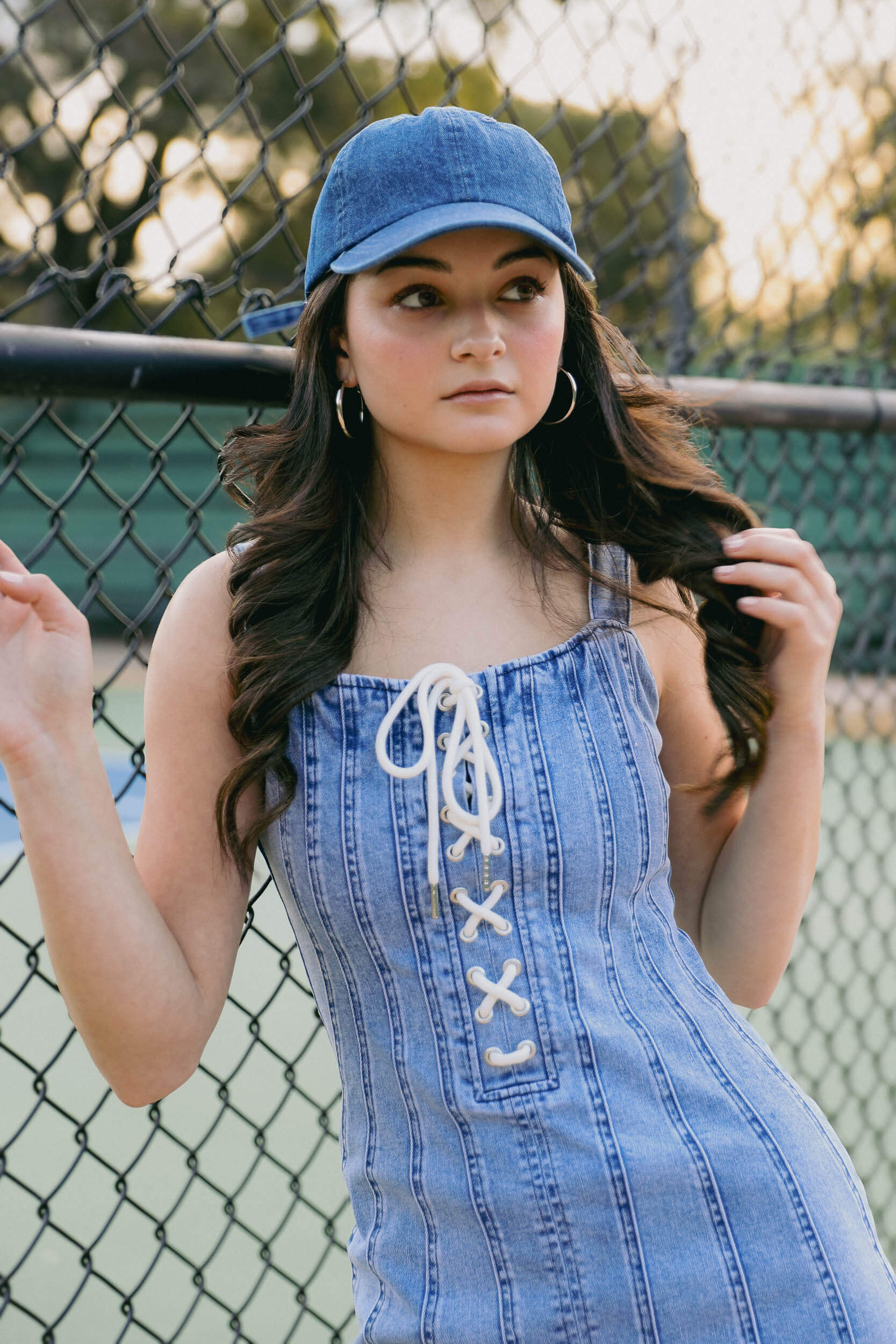 Womens blue baseball cap with adjustable strap in back