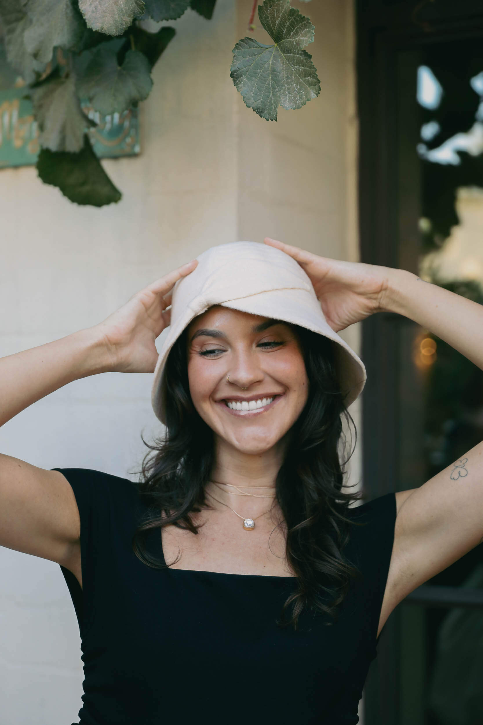 Womens cloche style hat in a cream color