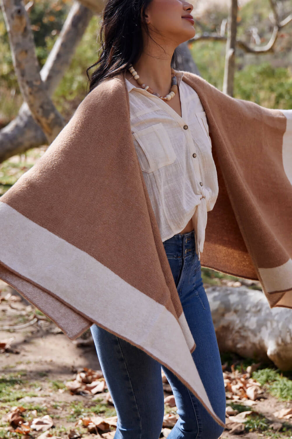 Women's brown and cream poncho sweater