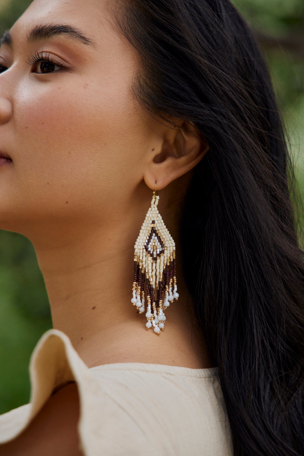 Women's beaded drop earrings with gold accents