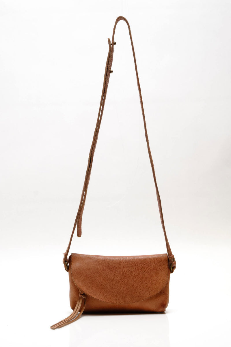 aged tan leather crossbody bag